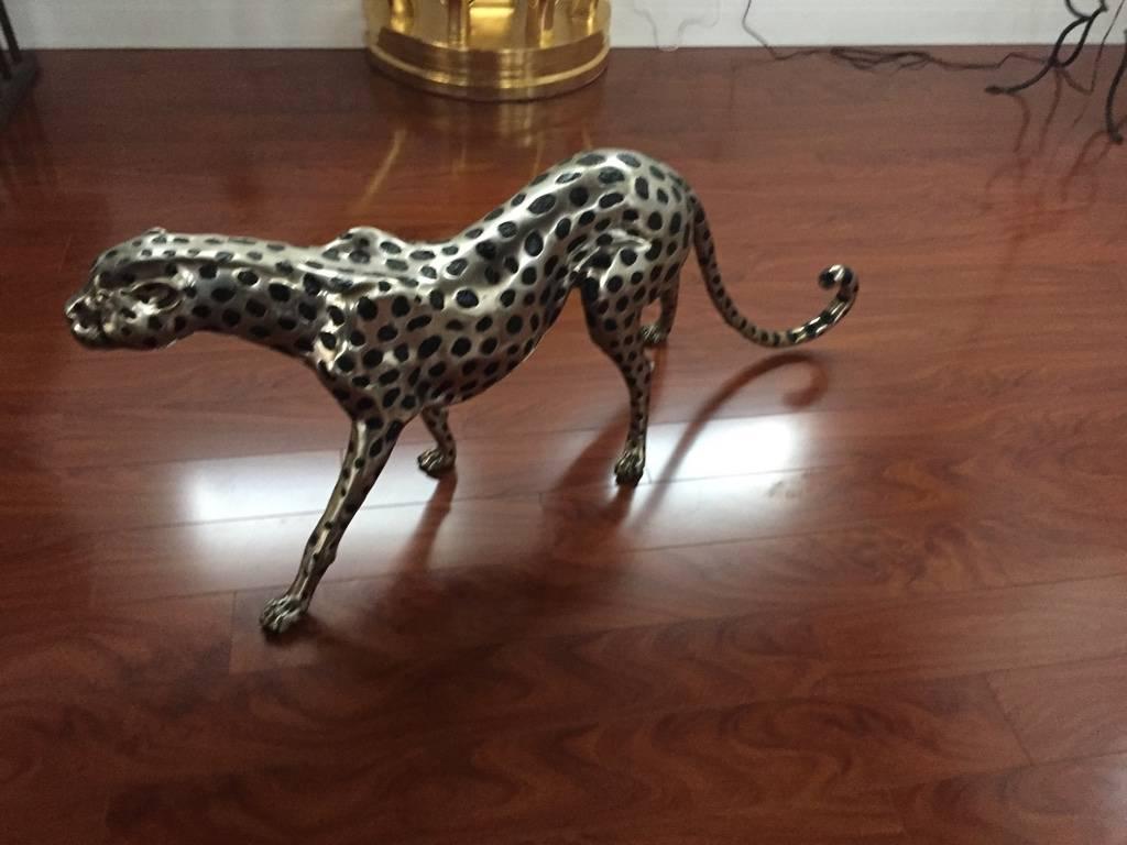 Stunning huge metal cheetah. Silver and black painted on metal cheetah.