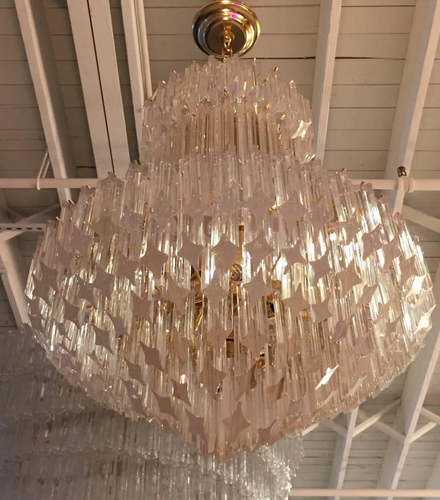 Mid-Century Modern Italian round chandelier by Camer. Each of the prisms are solid glass. They hang beautifully from hooks on a brass frame, as pictured. Any amount of chain can be added for custom hanging length of the chandelier. A pole can be