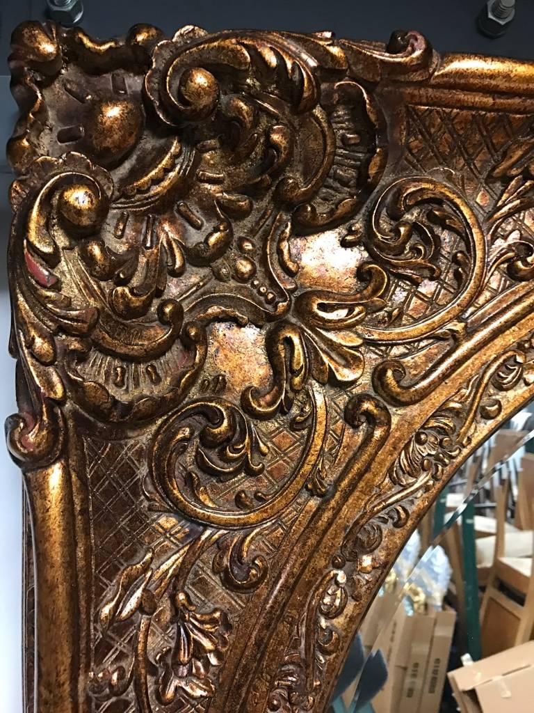Giltwood Mirror with Ornate Details For Sale 1
