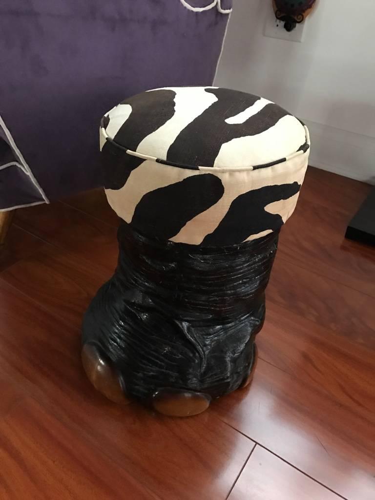 Mid-Century Modern faux elephant foot base with zebra print upholstered seat.