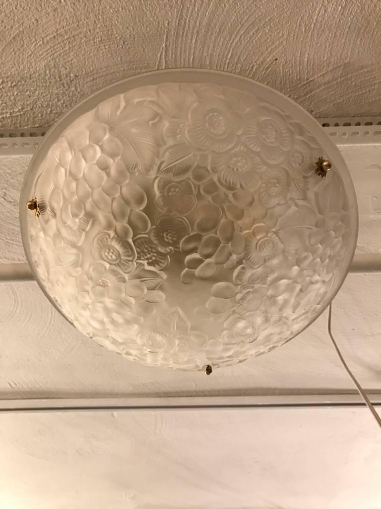 Stunning French Art Deco semi flush mount chandelier by the French artist Verdun. Molded clear frosted glass shades decorated with floral motif. The shade is marked M. Model Verdun.