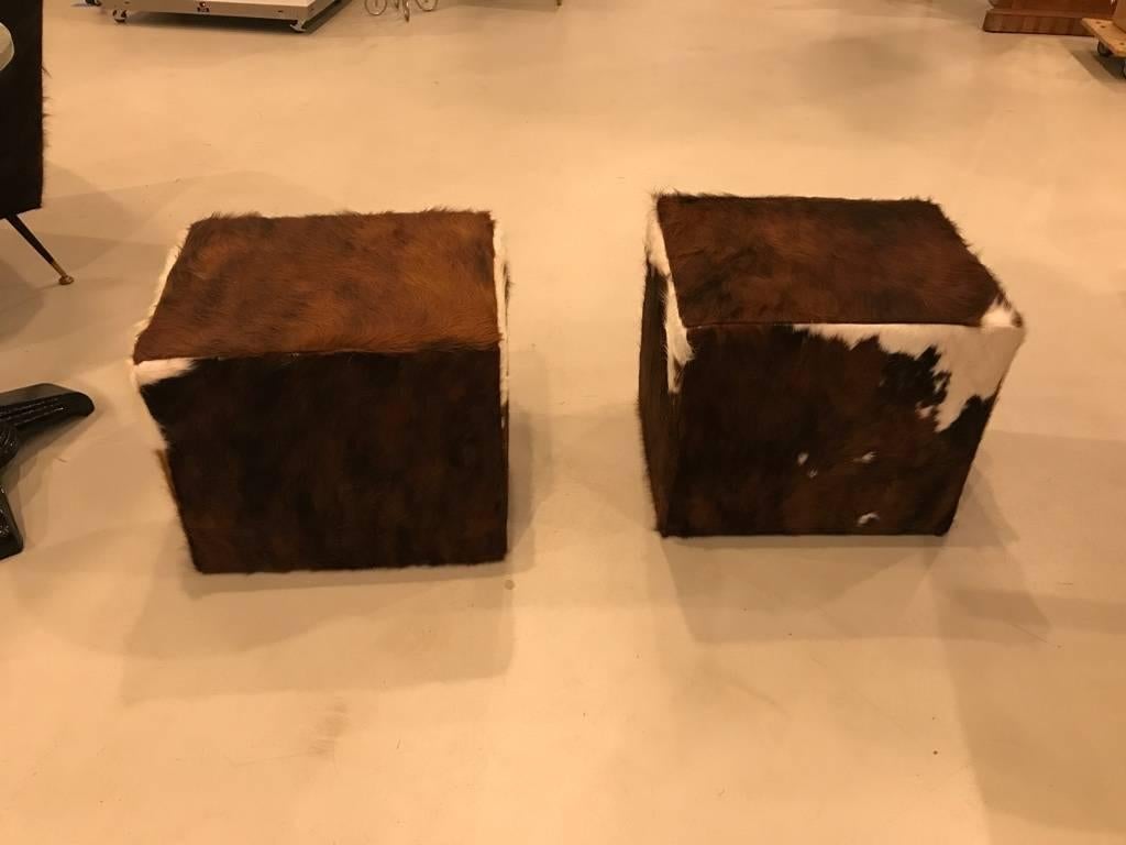 Modern Pair of Cow Hide Benches or Ottomans