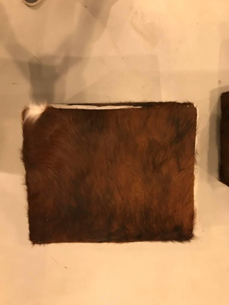 Pair of Cow Hide Benches or Ottomans 1