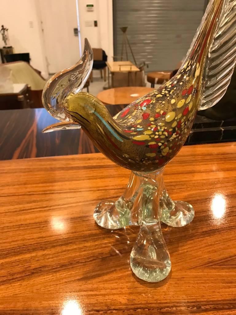 Pair of Mid-Century Modern matching Murano glass roosters. Clear and multi-color glass. 


Dimensions are based on looking at them head on.