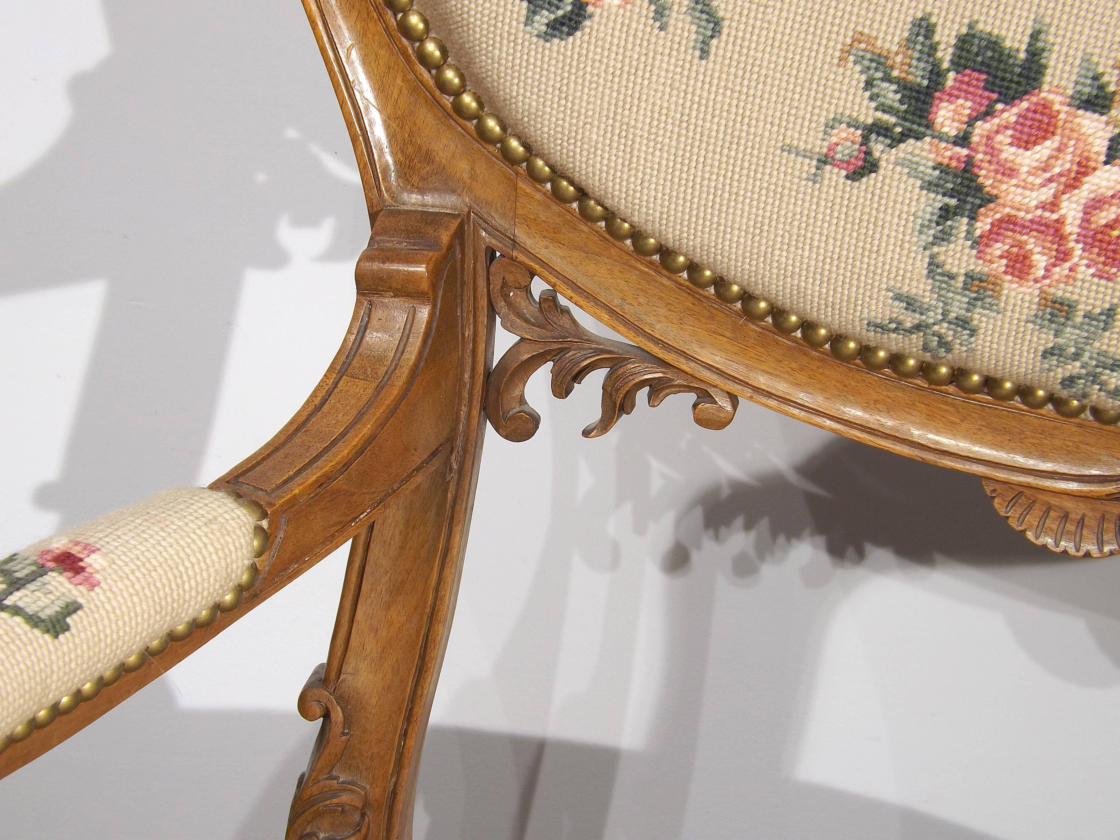 Pair of Louis XV Walnut Asymmetrical Fauteuils with Needlepoint In Good Condition In Charlevoix, MI