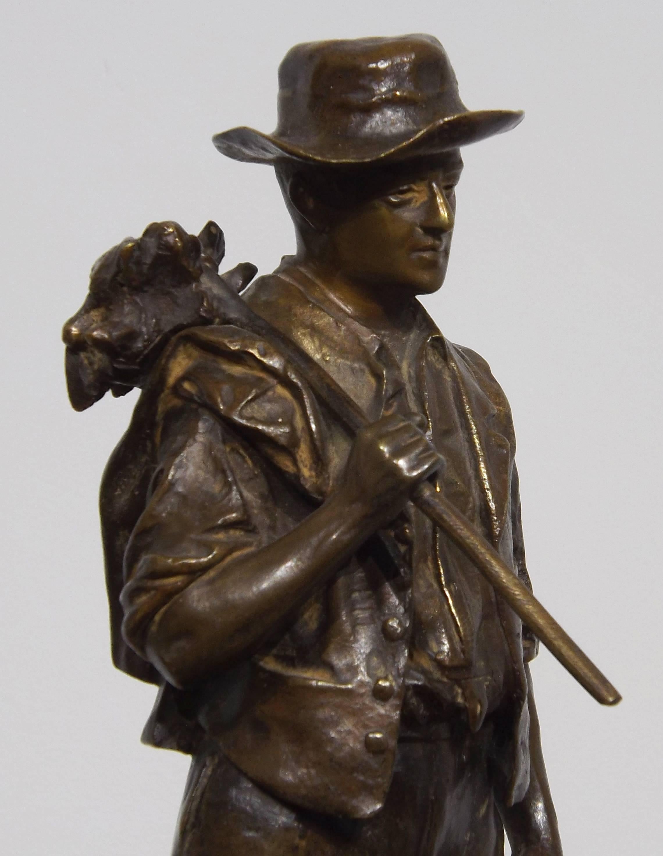 A nice example of a early period cast bronze of a farmer off to work by French sculptor Jean Garnier.

Garnier was born in Mouzeuil in 1853, and was active in Paris and Montfermeil until his death in 1910. Exhibited at the Salon des Artiste