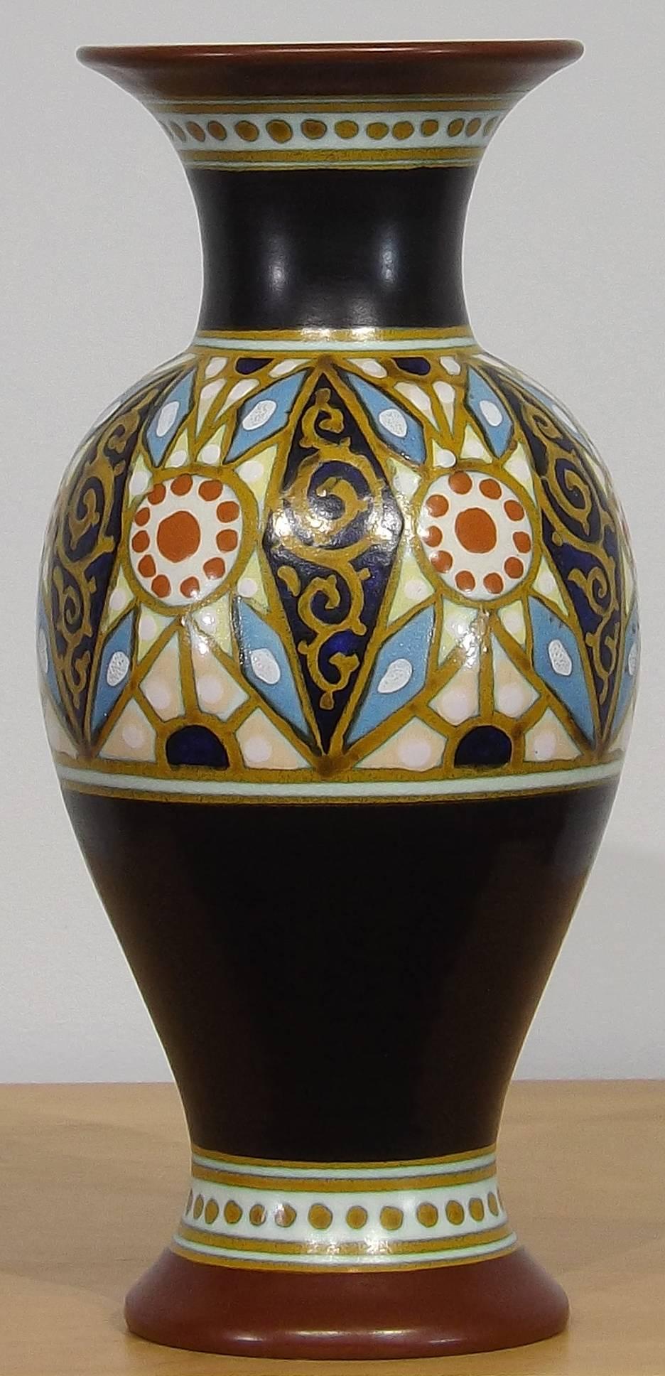A classically styled and hand-painted Gouda vase by Plateelbakkerij Zuid-Holland, or better known as Plazuid. The Netherlands, circa 1910
