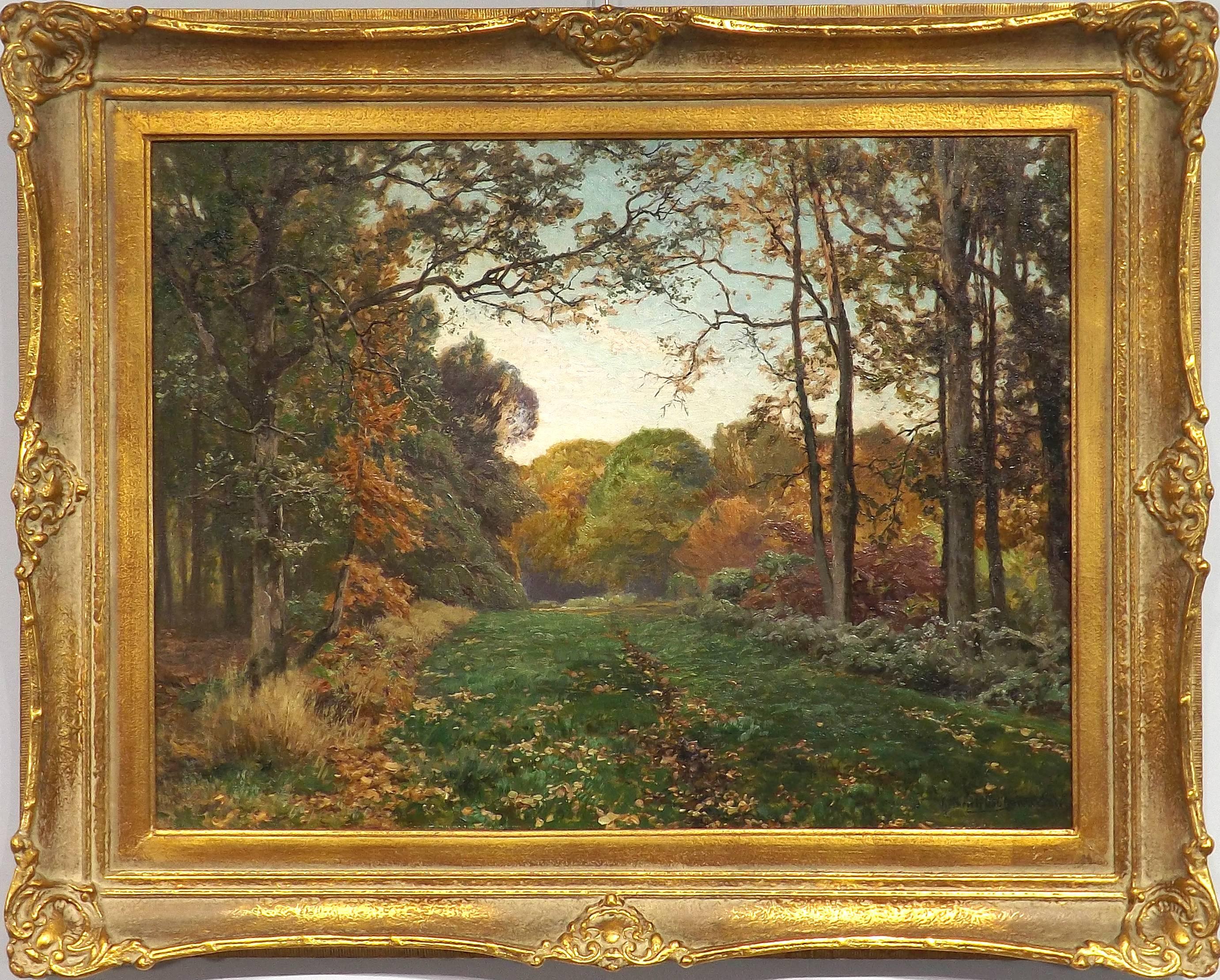 An idyllic scene of a forest path painted by Dusseldorf painter Heinrich Böhmer (1852-1930), with trees starting to show the first signs of autumn.

Böhmer started his studies at the Dusseldorf Art Academy in 1876, and by 1881 he was the star