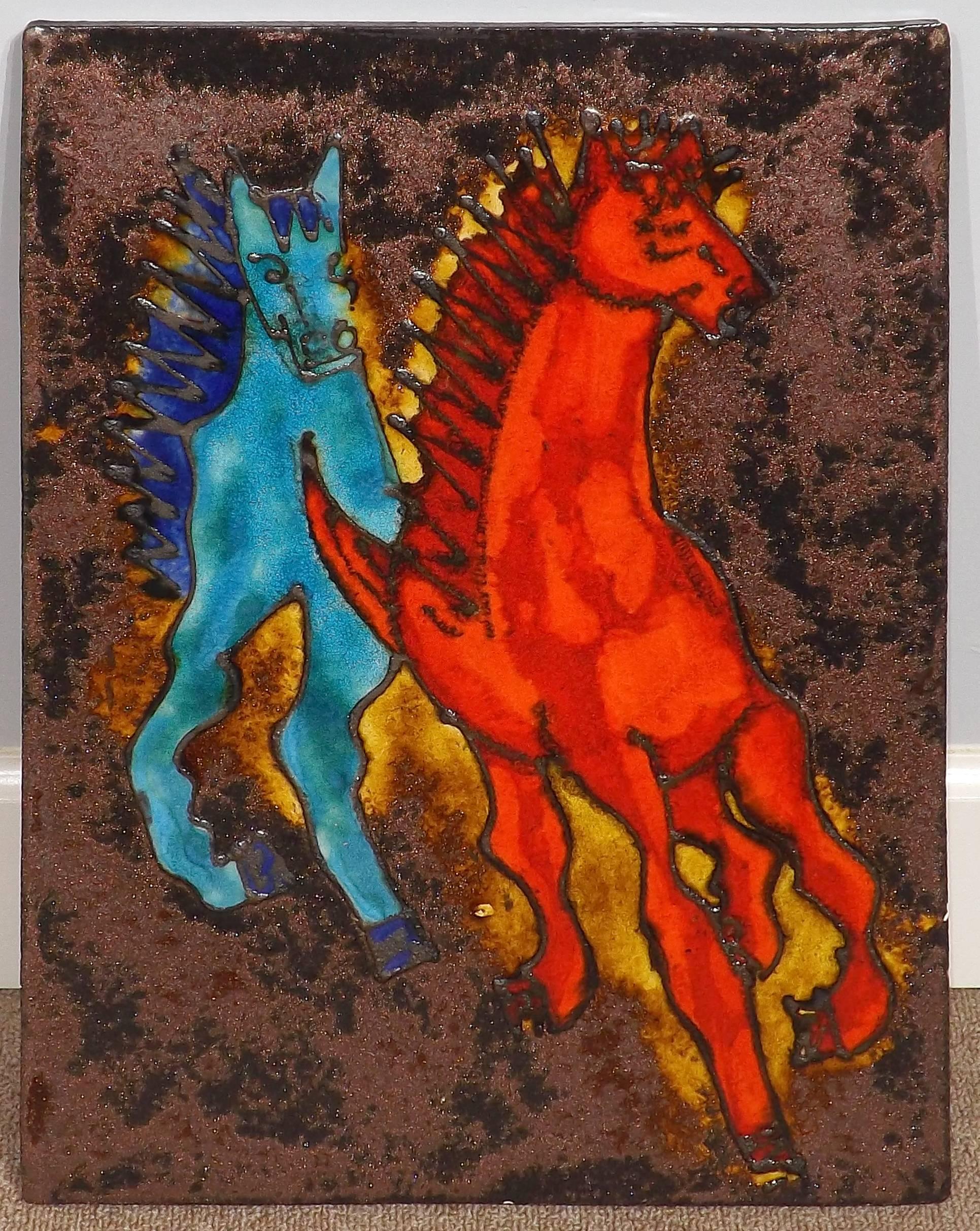A magnificent hand-painted tile with two galloping horses by the German ceramic firm Ruscha. Both of the figures are boldly represented in bright colors on a metallic sheen background. Marked 'Ruscha Handgemalt' (hand-painted) verso.