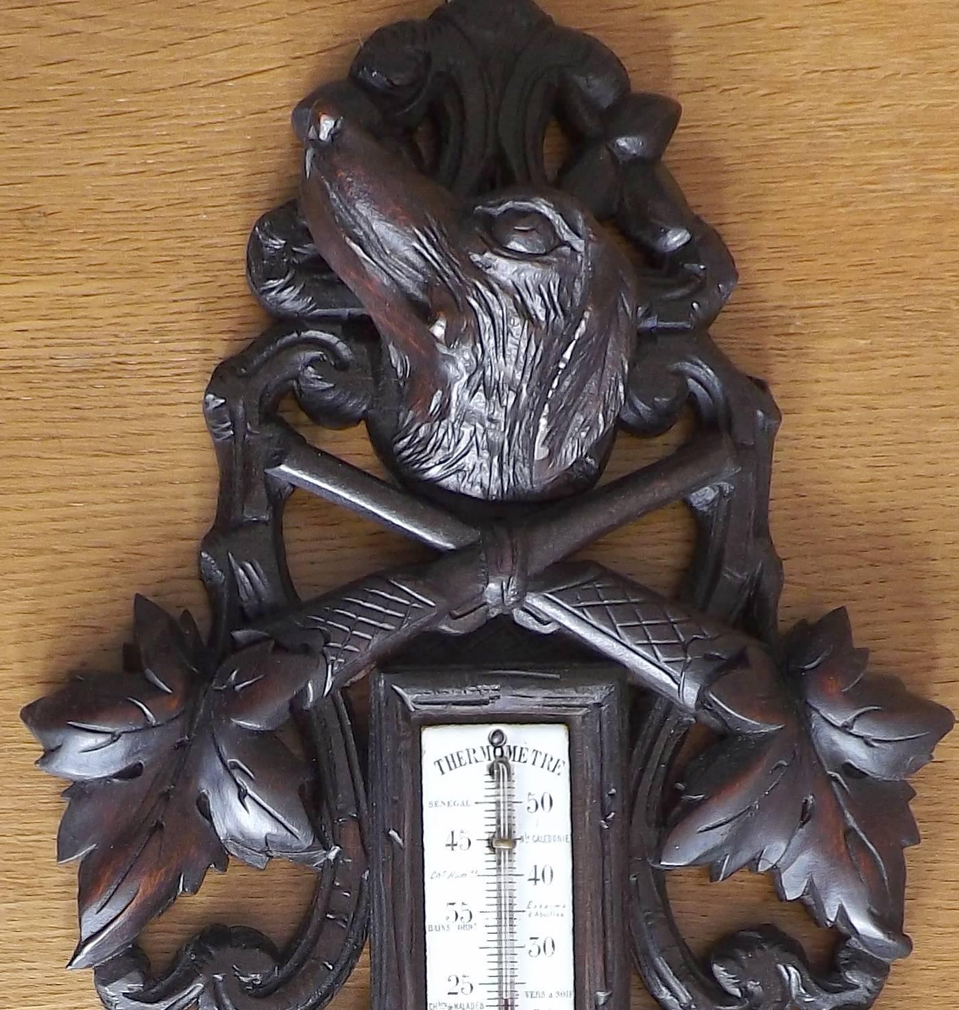 A handsome carved French barometer from the late 19th century. Alcohol thermometer (not mercury) is in centigrade and includes anecdotal information such as what temperature wine sets at.
