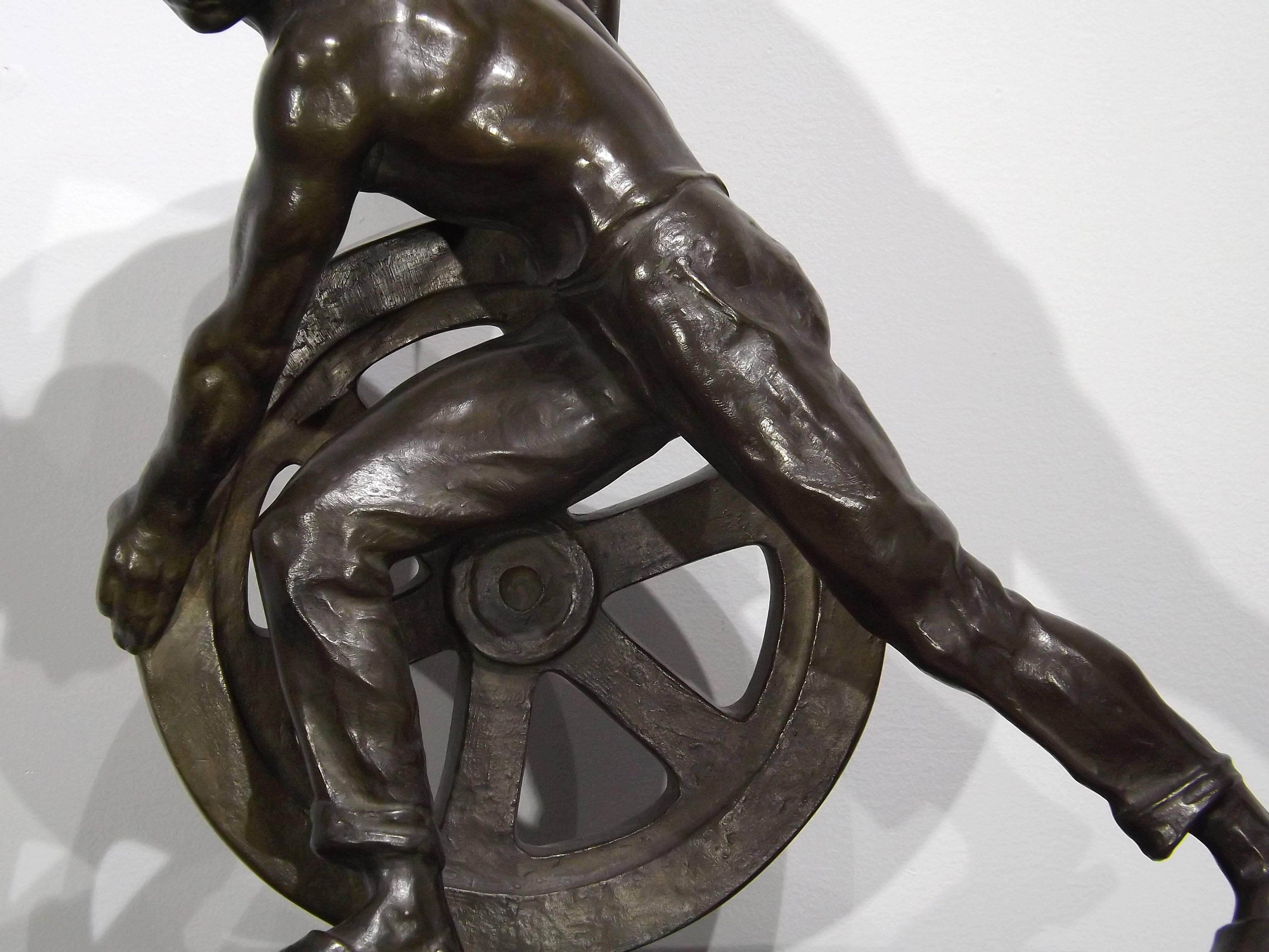 German Bronze of a Man Pushing a Wheel by Ernst Seger For Sale