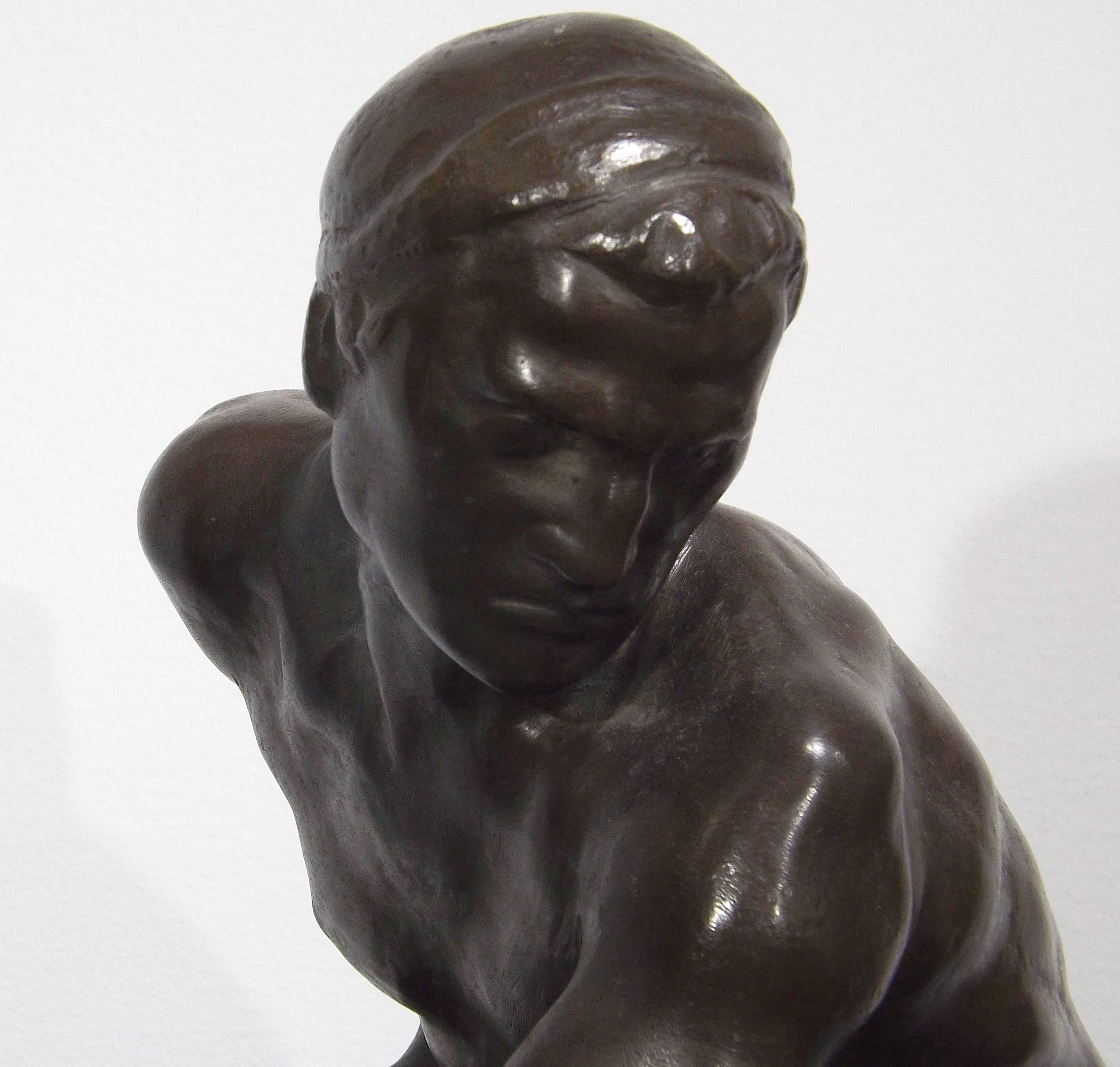 Bronze of a Man Pushing a Wheel by Ernst Seger For Sale 1