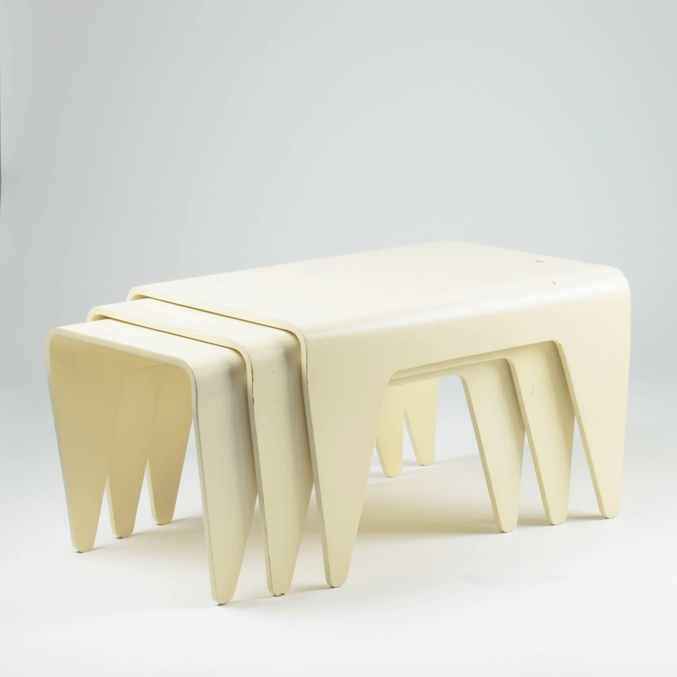 Marcel Breuer,
Isokon (manufacturer), London UK

'Isokon Tables' designed 1936.

Set of three nesting tables.
Cream-white lacquered plywood.
Stunning rare set in good original condition.

(References: Modernist, organic Modernism, plywood,