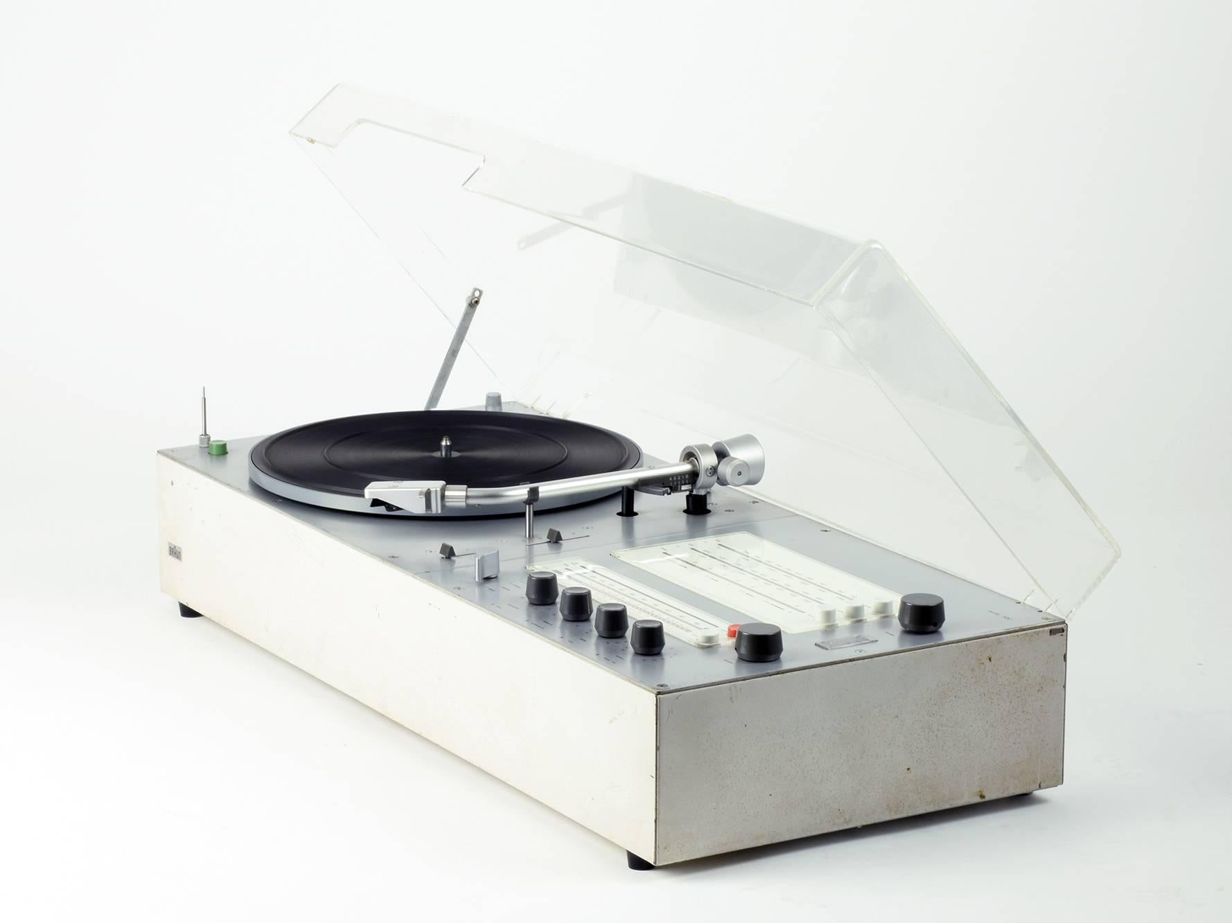 Dieter Rams
Braun AG, Germany (manufacturer)
Audio 300, hi-fi system (turntable/amplifier/tuner), 1969

White casing, aluminium coloured metal front/top panel with grey, graphite and coloured switches, acrylic lid.
Serial number 11970

A