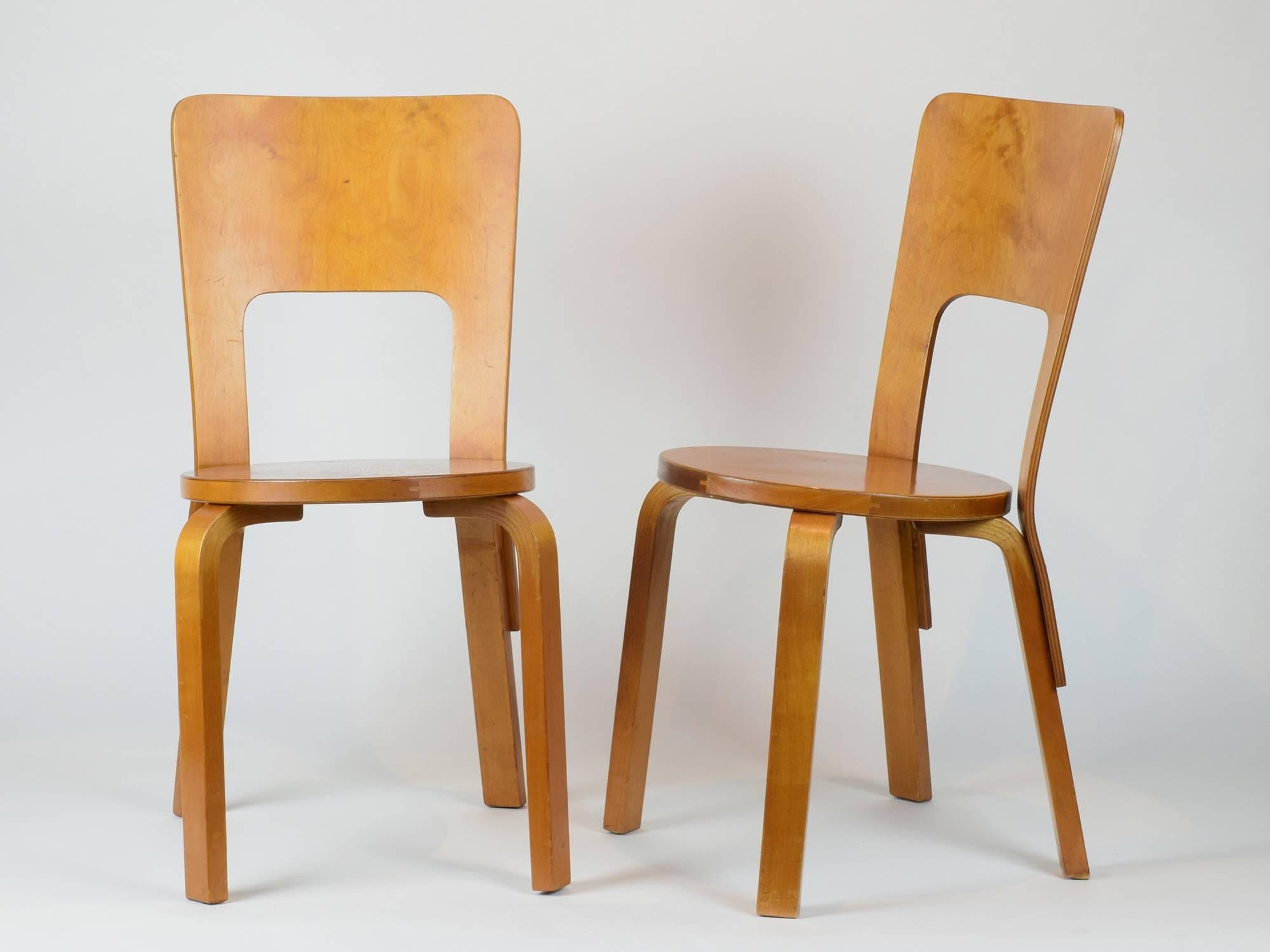 Alvar Aalto
Artek (manufacturer), Finland

Chair Model 66, 1933 (pair)

Birch and birch laminated plywood,
Original Finmar plastic label and Bowman Bros stamps to undersides.
Imported into the UK by Finmar, distributed by Bowman