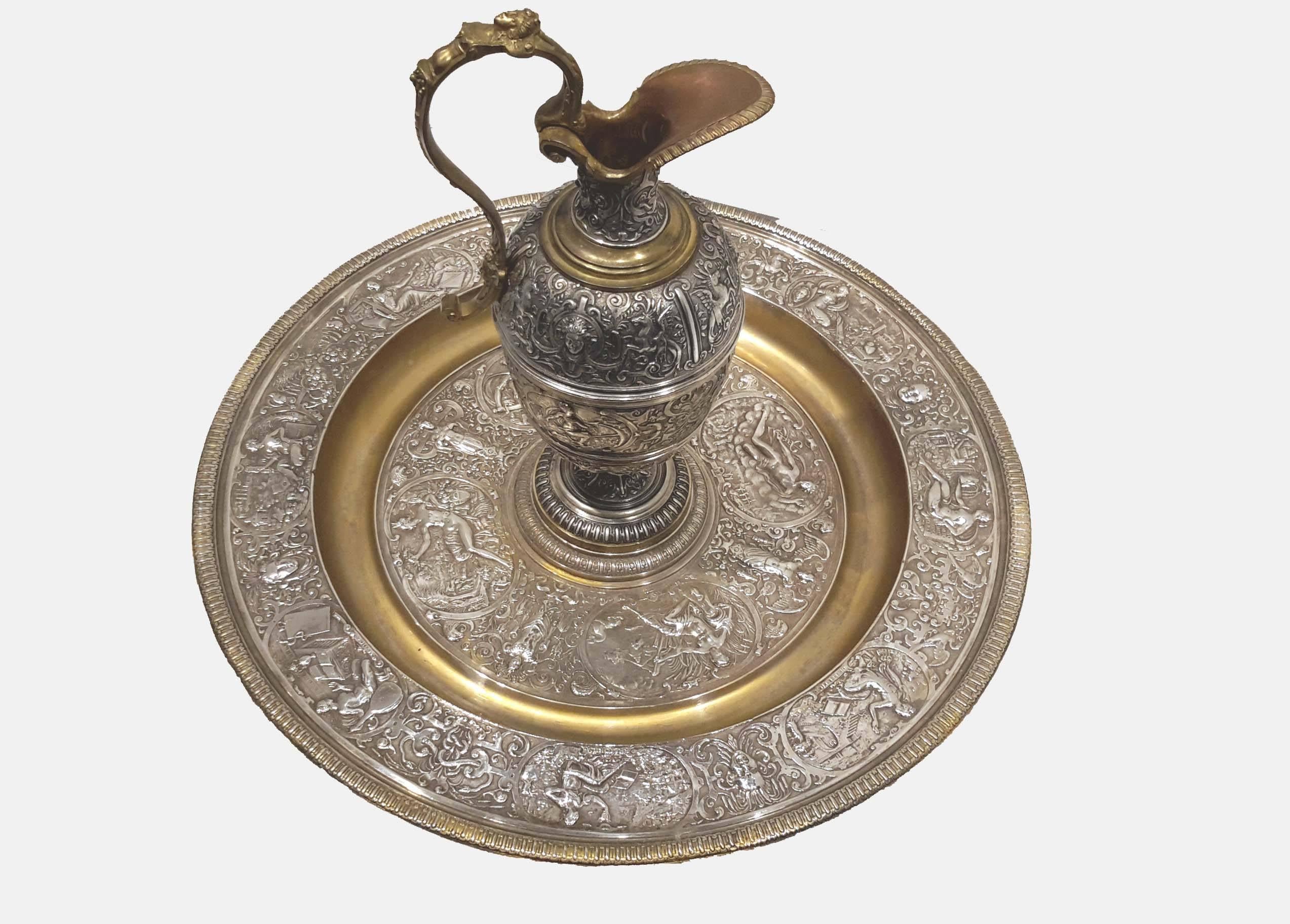 Attributed to Elkington Co. Renaissance Revival electroplate charger and ewer, 19th century. Tray 17 1/2