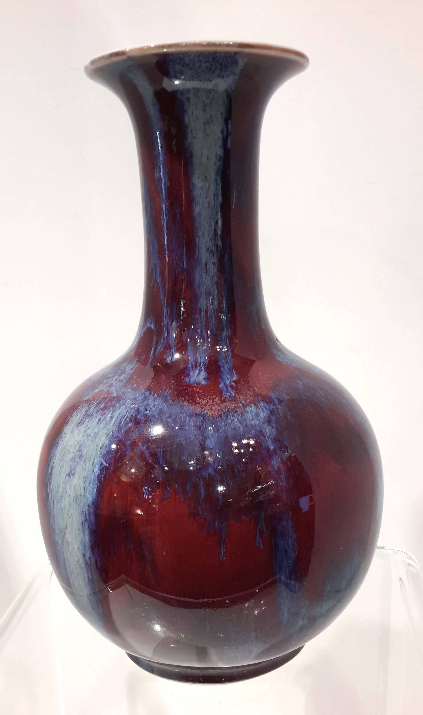 Beautiful shape and great flambe glazed porcelain vase.