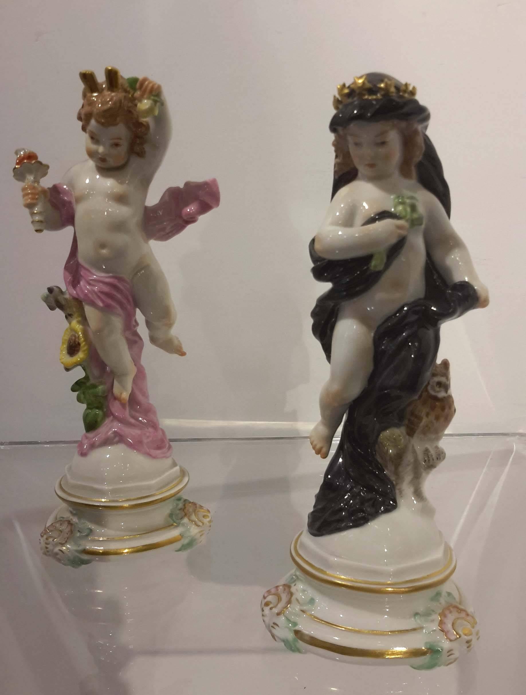Pair of first quality Meissen figures of night and day, 19th century. Underglazed crossed swords mark.
Day figurine: Height 7 inches, width 2 3/4 inches, depth 2 1/2 inches.
Night figure: Height 6 3/4 inches, width 2 inches, depth 2 inches.