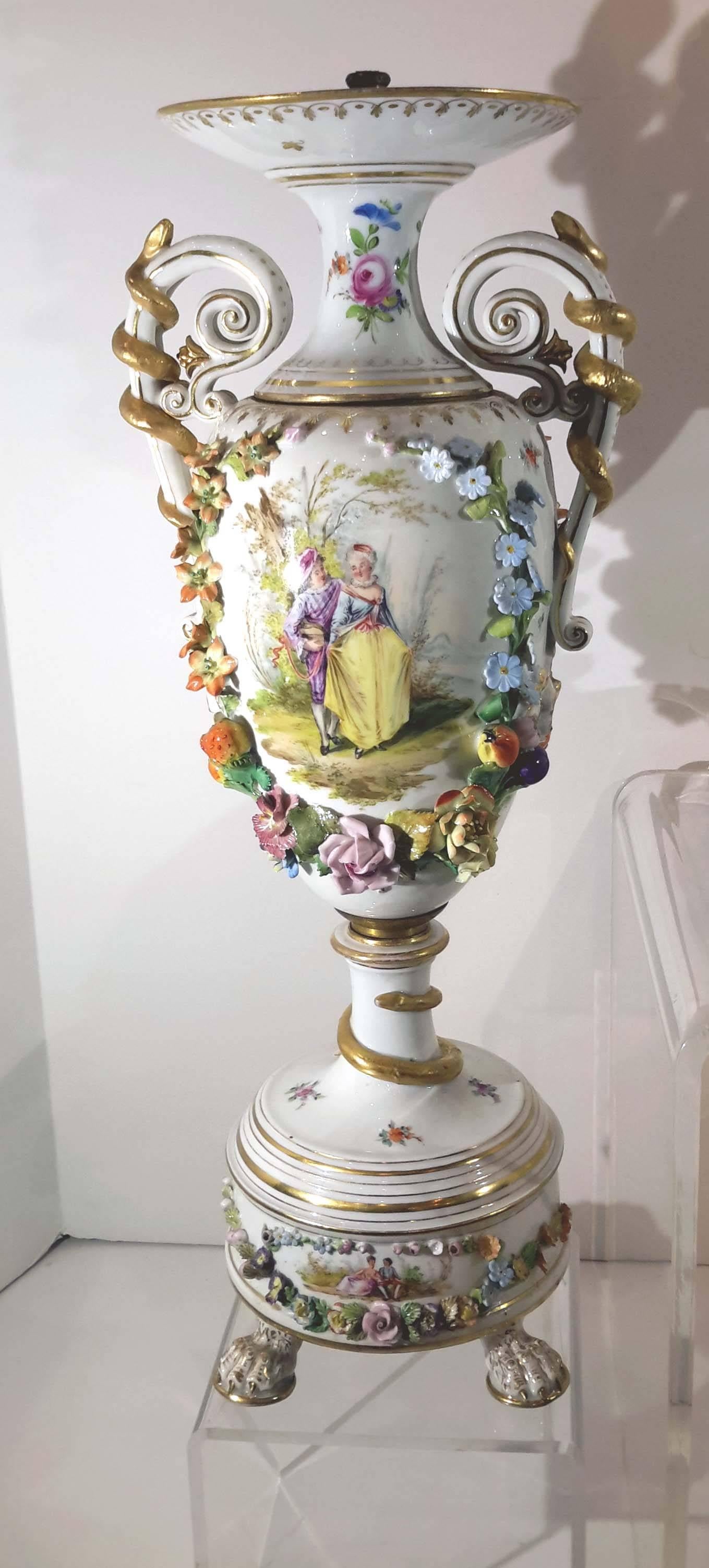 Hand-painted and flower encrusted porcelain and with great details.
These vases were electrified at one time.
With very few little chips to the raised floral decoration.
They have the Underglaze blue mark.