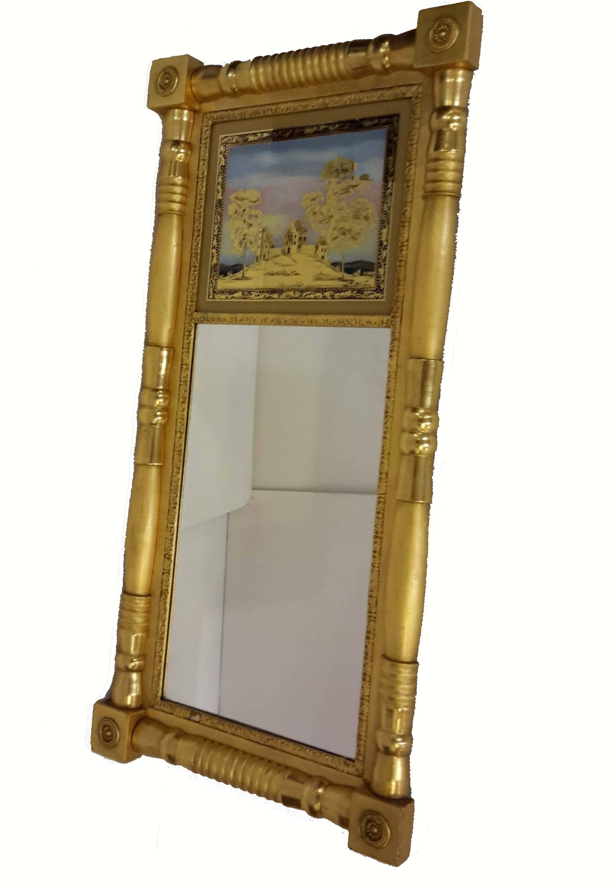 Federal gilt-gesso split-baluster mirror. Reverse-painted upper tablet.