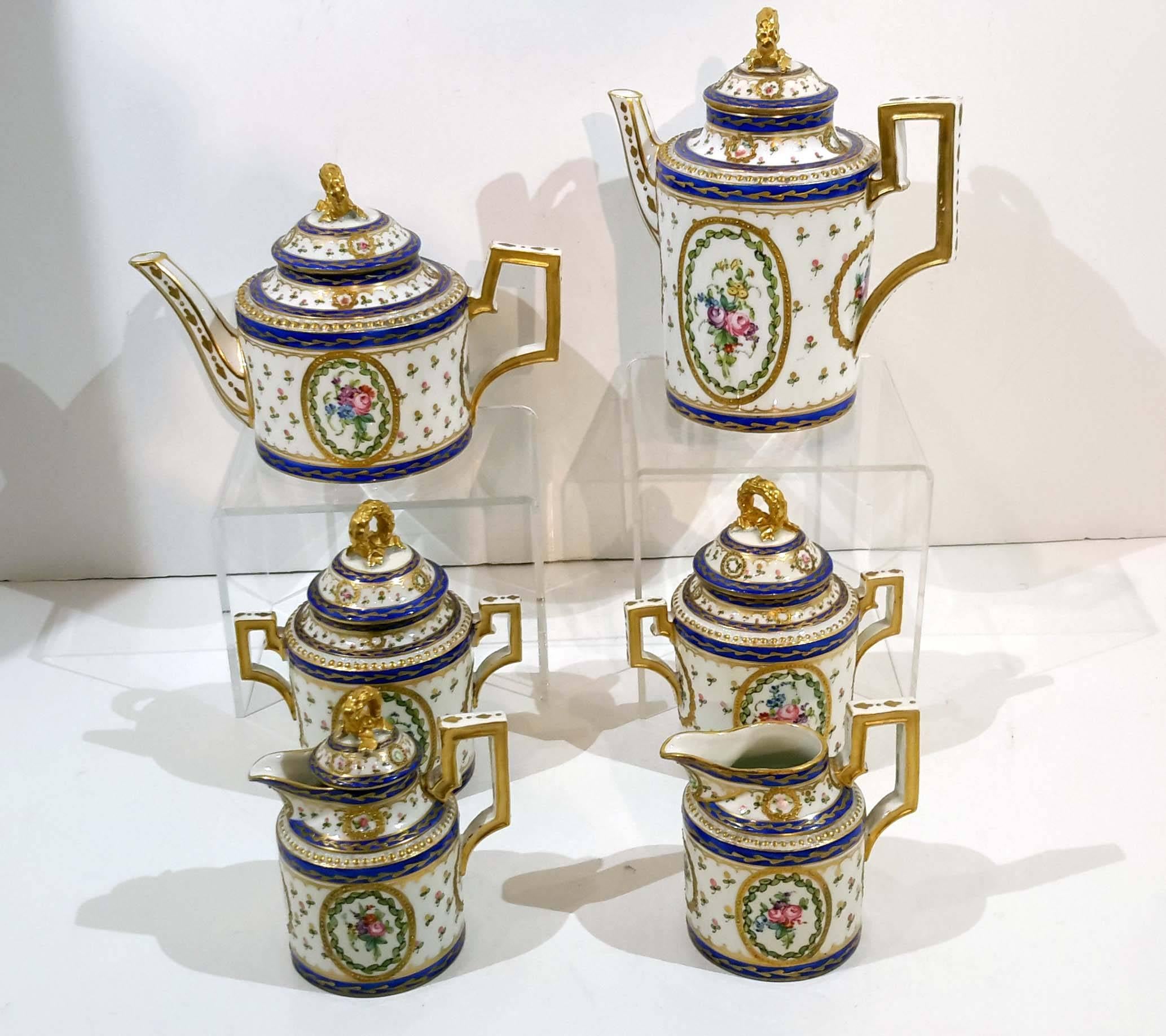 Raised gilding and hand-painted floral decoration on a white porcelain background with underglazed cobalt bands, in great condition.
Marks of Samson porcelain manufacturing, circa mid-19th century.
There are two creamers, one without lid. there