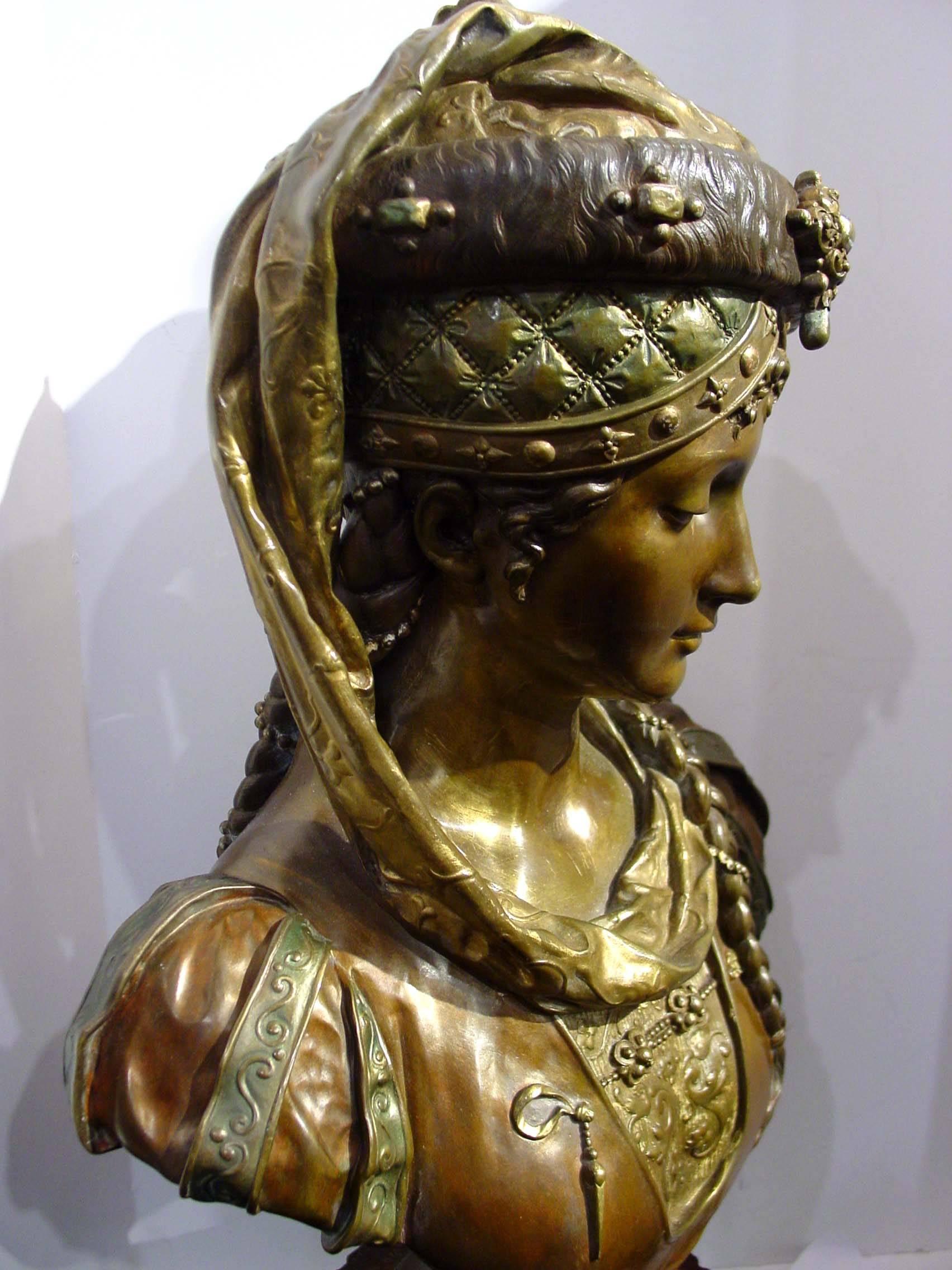This is an original 19th century bronze bust by French artist Eugene Robert (1831-1912). Masterfully executed bronze bust of a medieval lady with amazing details.
Signed on the back: Eugene Robert.
The rouge marble base measures: 5