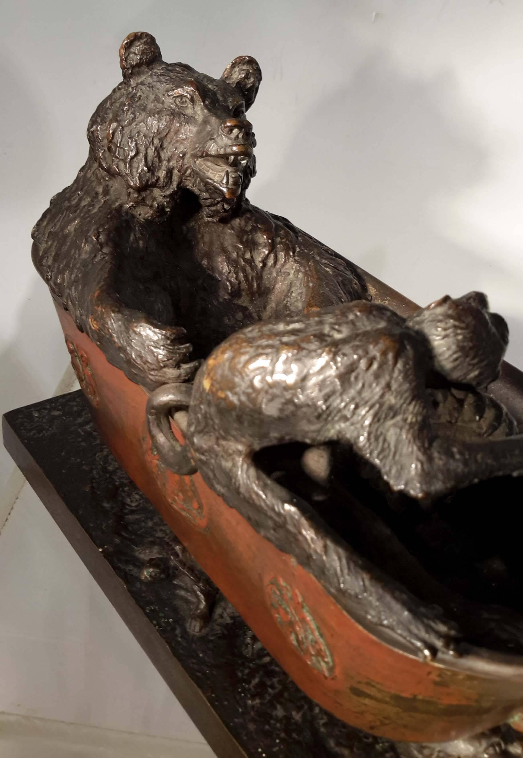 A rare bronze sculpture signed: Fratin. 
circa 1850s. Depicting a erotic subject of a monkey giving pedicure to a bear taking a bath. The bath tub with four turtles as legs and decorated with devil motif. 
Great quality cast bronze, silvered on