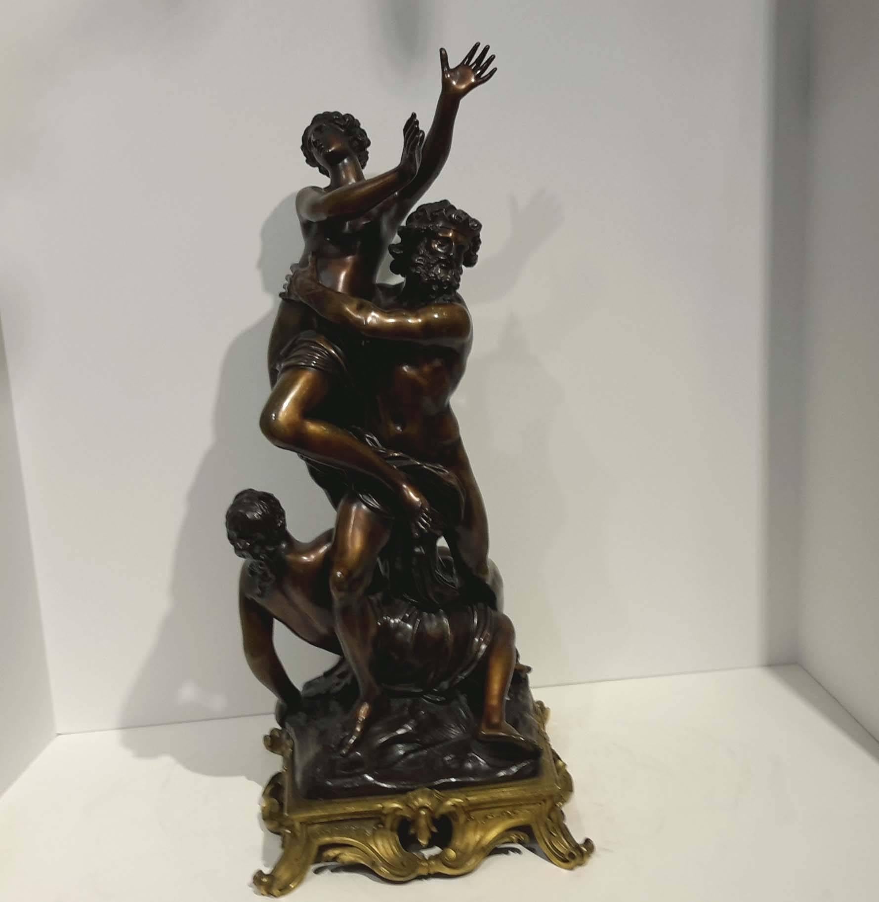 Mounted on an ormolu pierced scroll and rock base. Based on Francois Giradon's great bronze group "L'Enlevement de Proserpine" was cast for the garden at Versaillles 1694-1699. Much influenced by Giambologna, reductions remain popular. In
