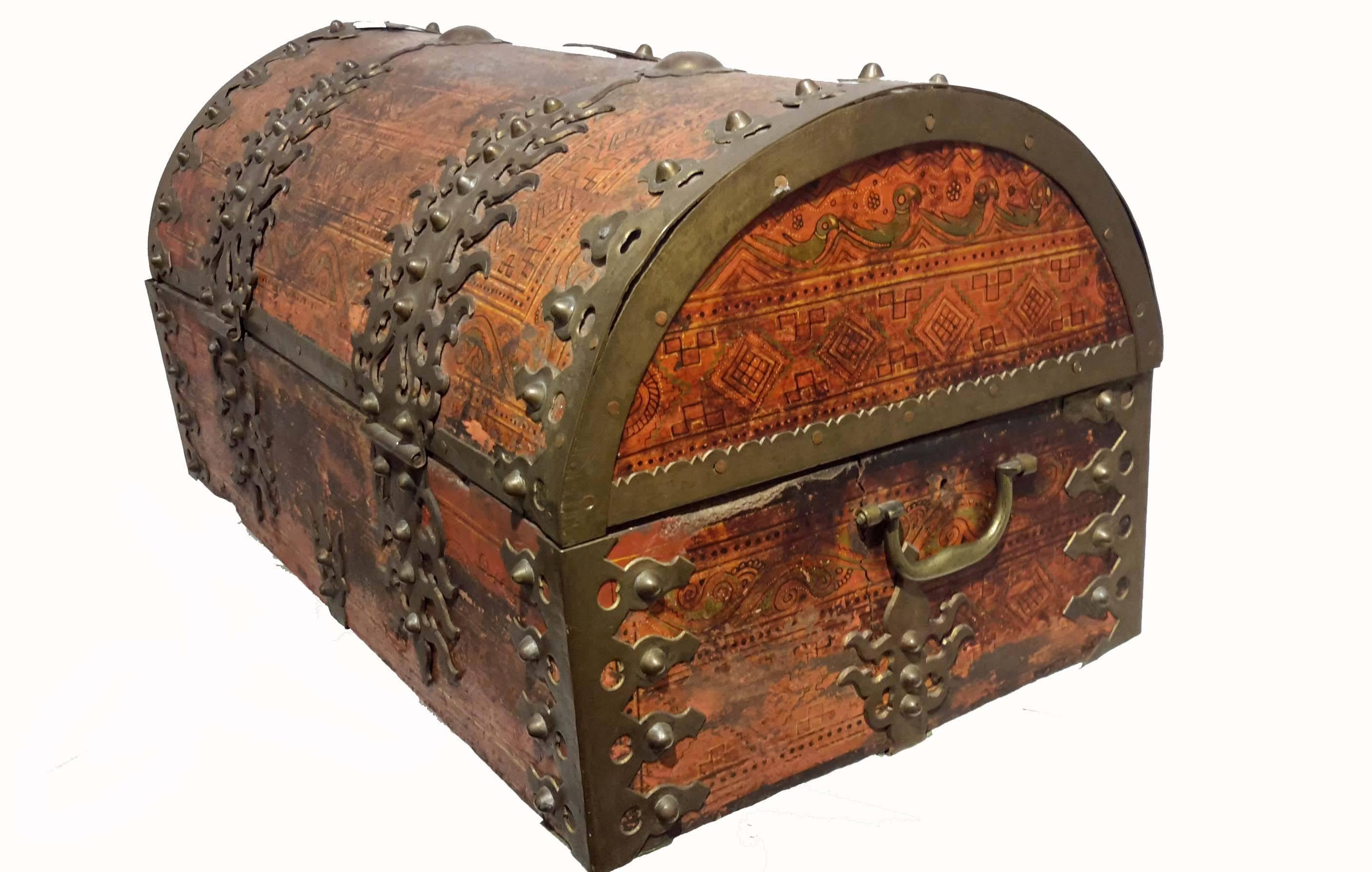 Very impressive, large size Indian strongbox used by the bridegroom to transport his gift of jewelry to the bride at their wedding. The wood is Portia wood , a hardwood in the teak family.   Hand painted decorations with parrots and mounted Brass