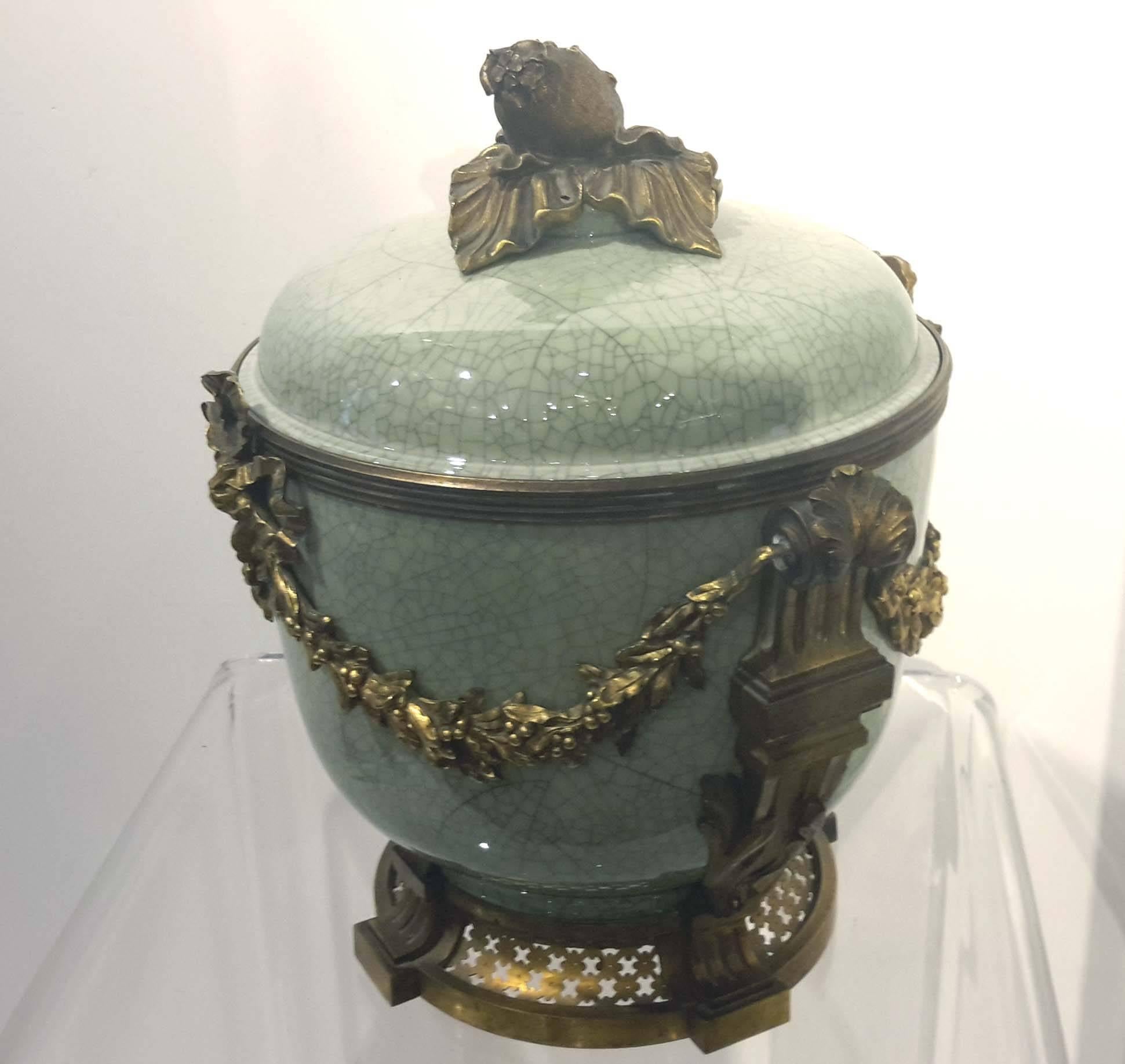 Gilt bronze-mounted celadon porcelain covered bowl, French, circa 1890. Great quality bronze mounts.
