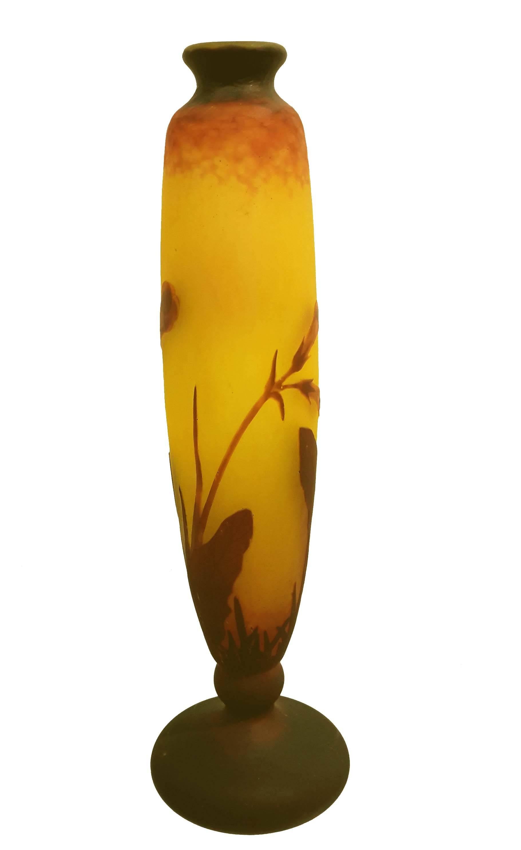 A Daum Nancy cameo glass vase, France, early 20th century. Tapered vase with floral decoration in Autumnal colors, engraved signature.
French, 1901-1925.