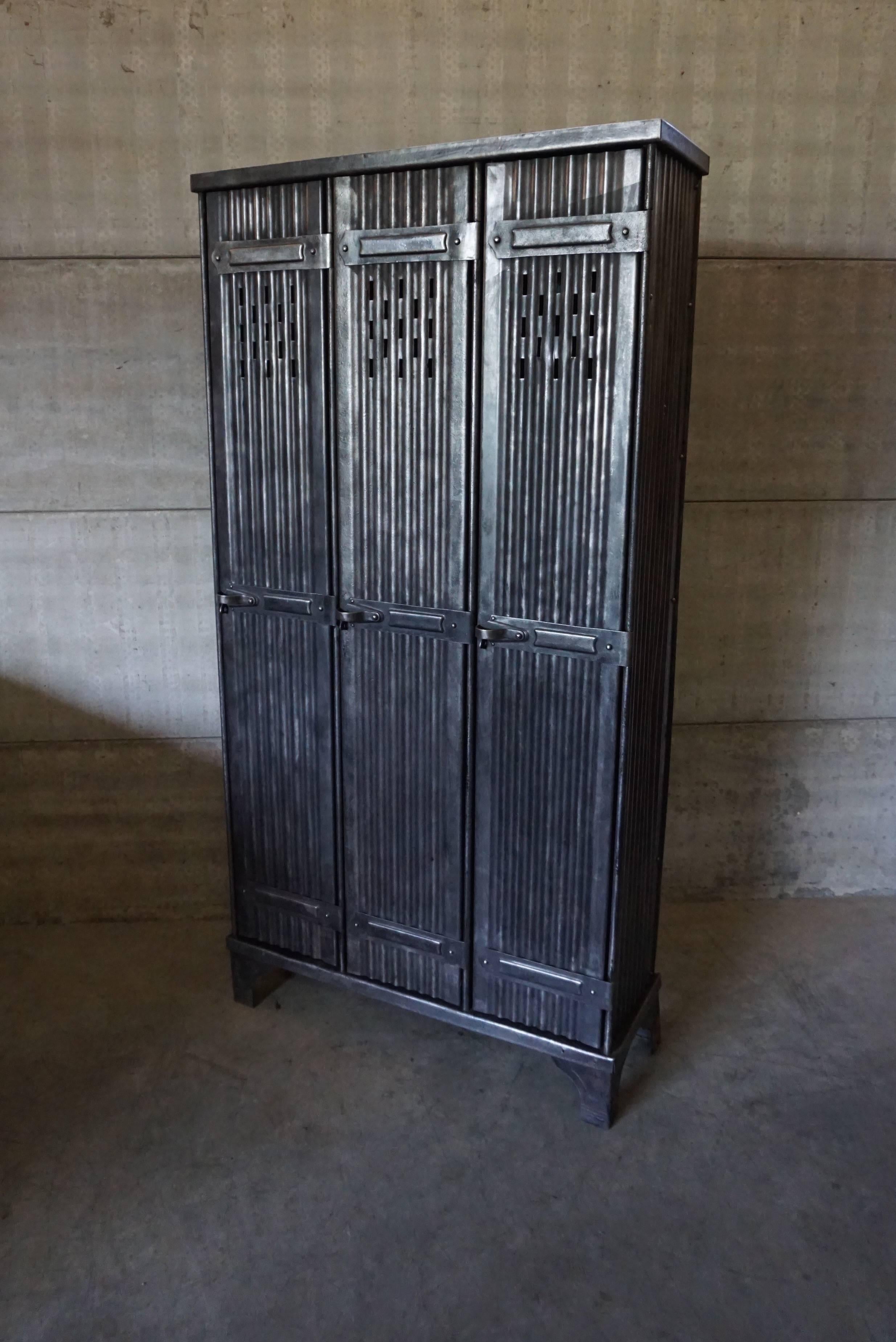 This vintage locker was manufactured by the French company Strafor. It is made entirely from metal and features three compartments. In a very good vintage restored condition.
