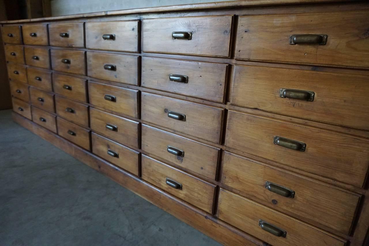 Industrial Vintage German Pine Apothecary Bank of Drawers, 1930s