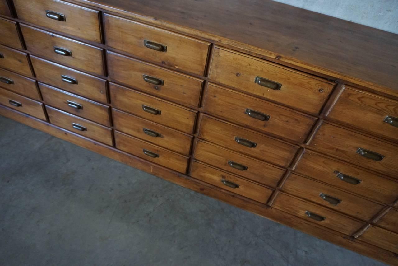 Vintage German Pine Apothecary Bank of Drawers, 1930s 4