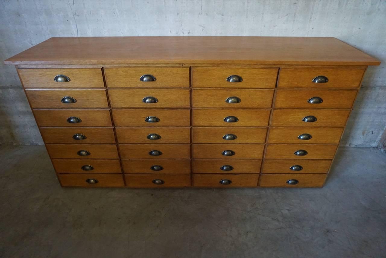 Industrial Vintage French Oak Apothecary Bank of Drawers, 1950s