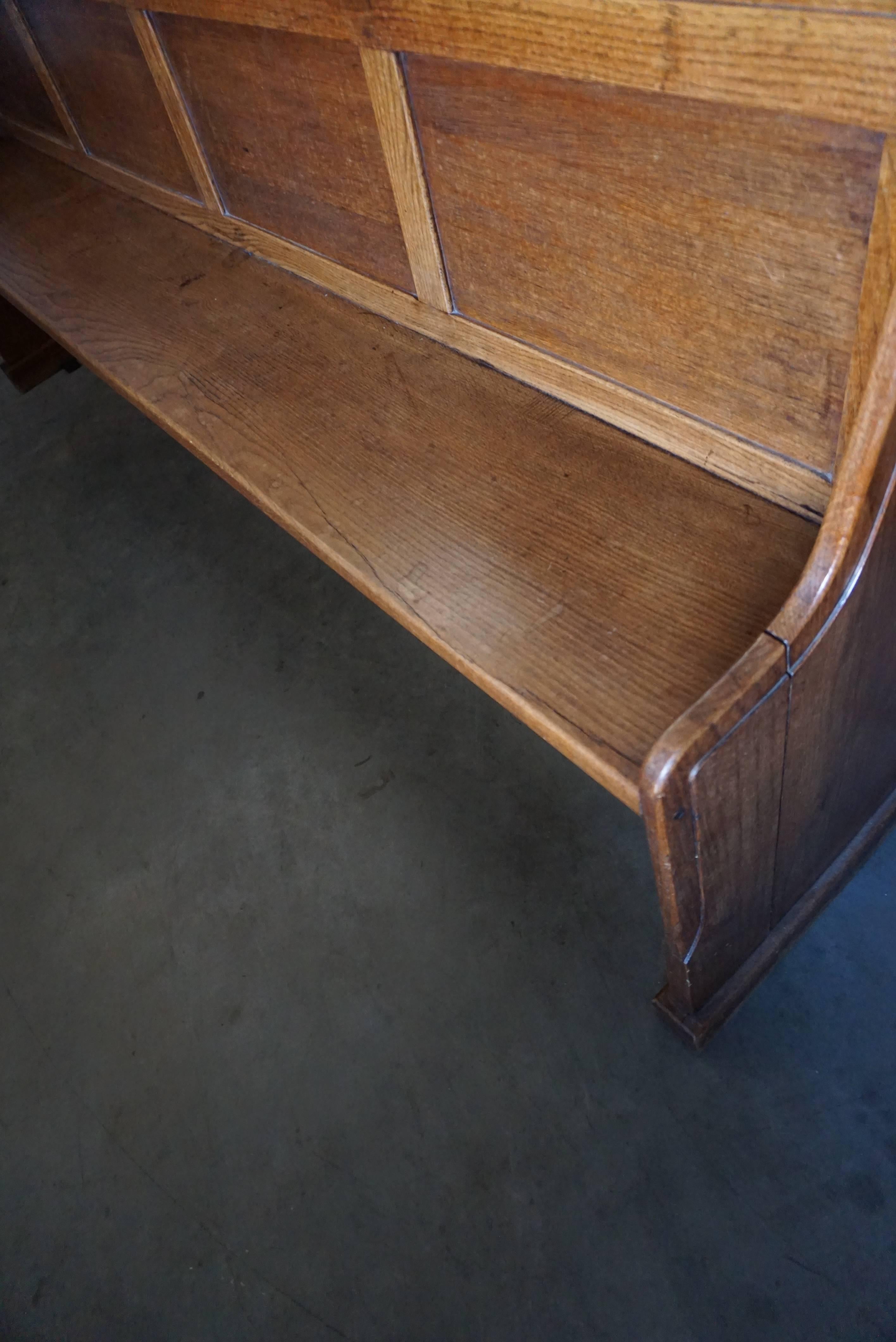 This oak church bench was made and designed circa 1900 in Germany. It is in a good vintage used condition.