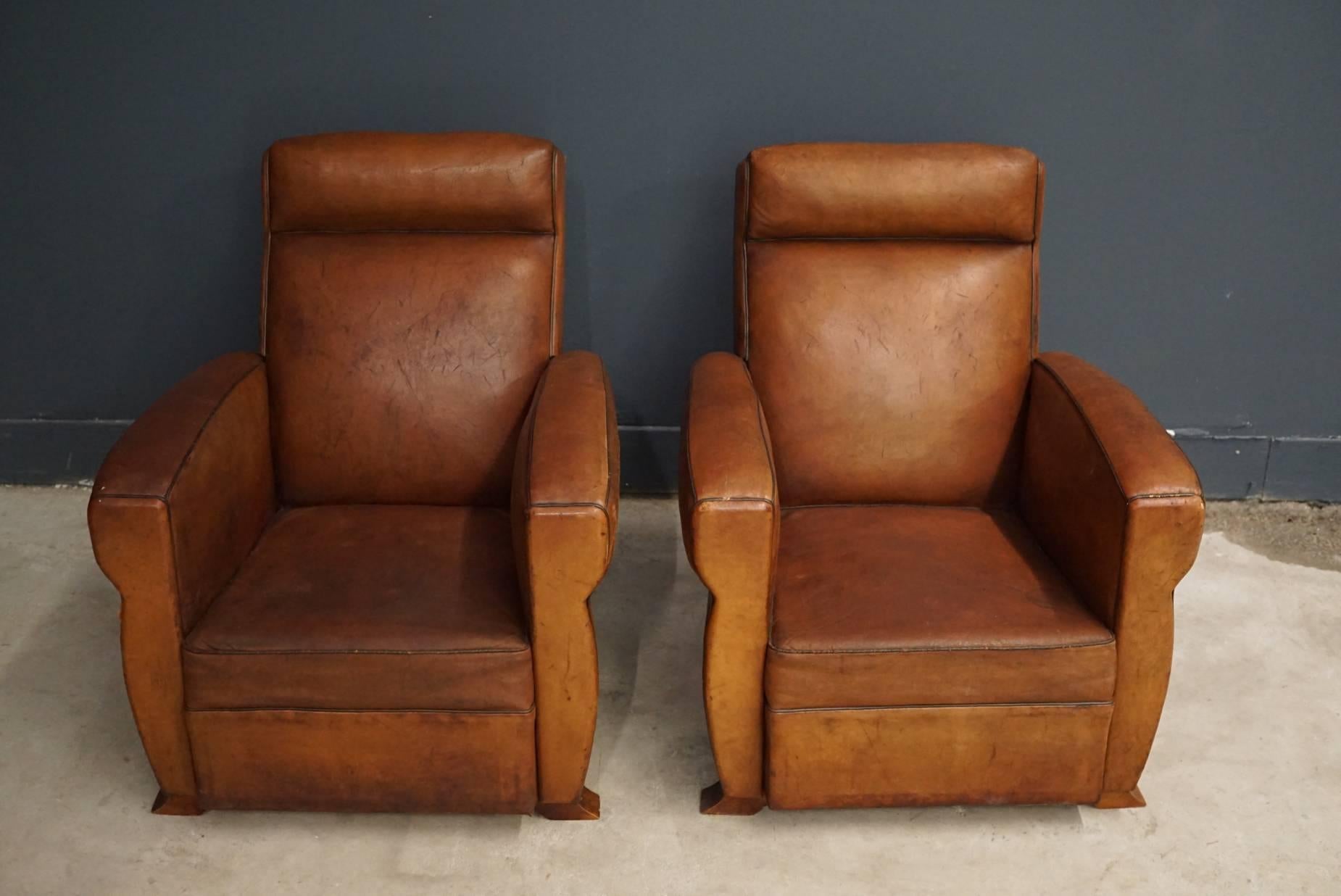 Industrial Pair of French Cognac Leather Club Chairs, 1940s