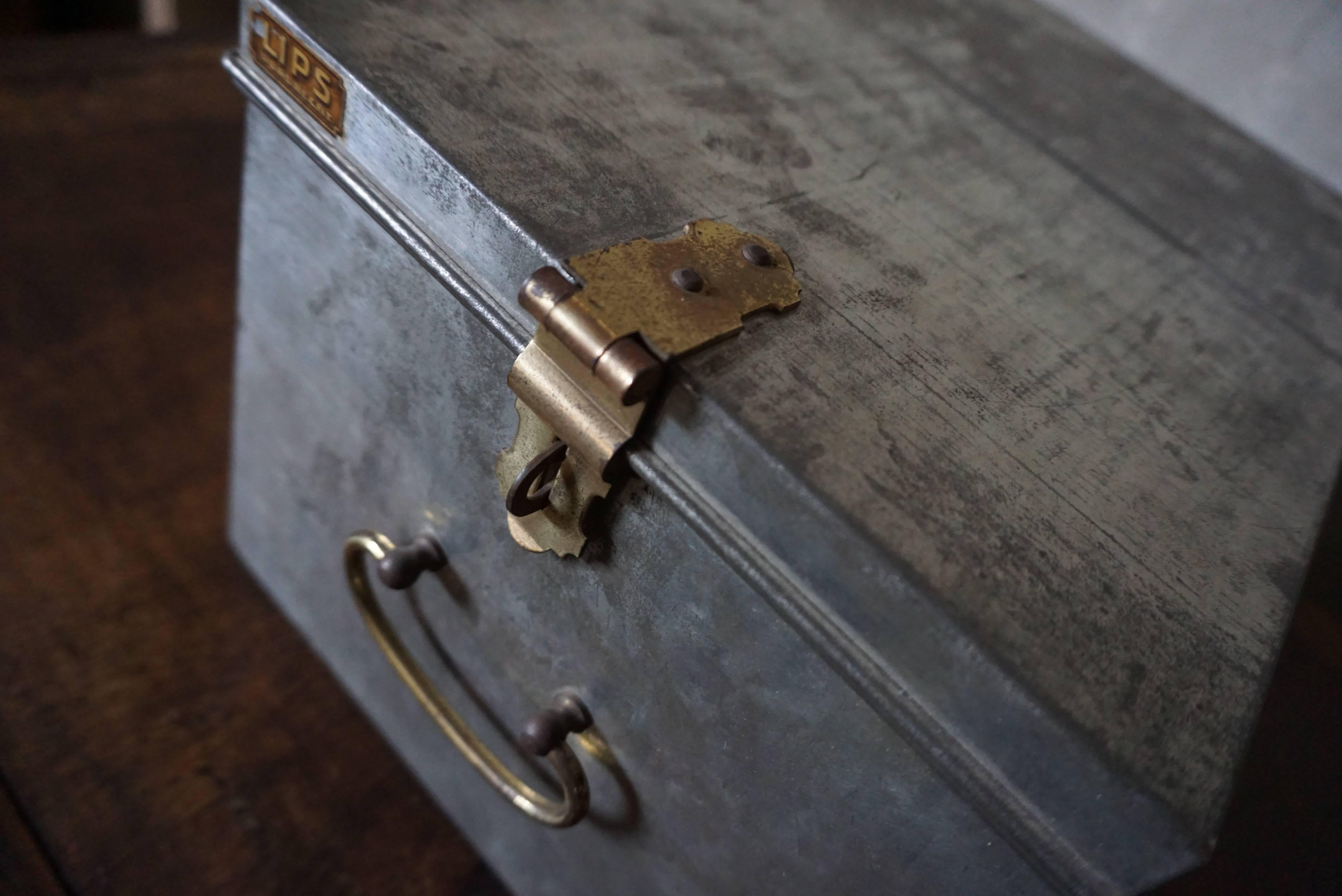 Vintage industrial safe box with brass details made by the company LIPS in the Netherlands mid of the 20th century.