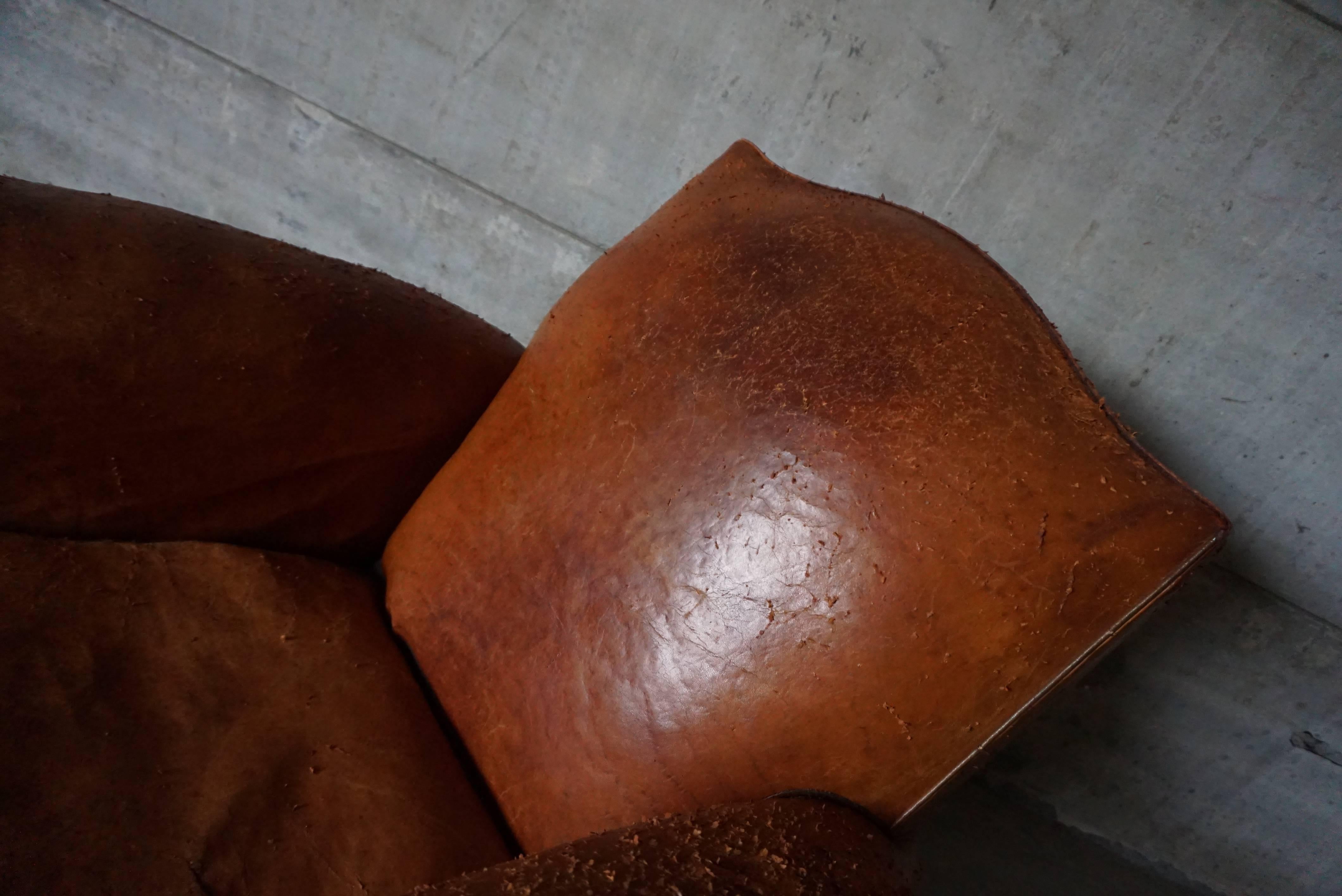 distressed leather club chair
