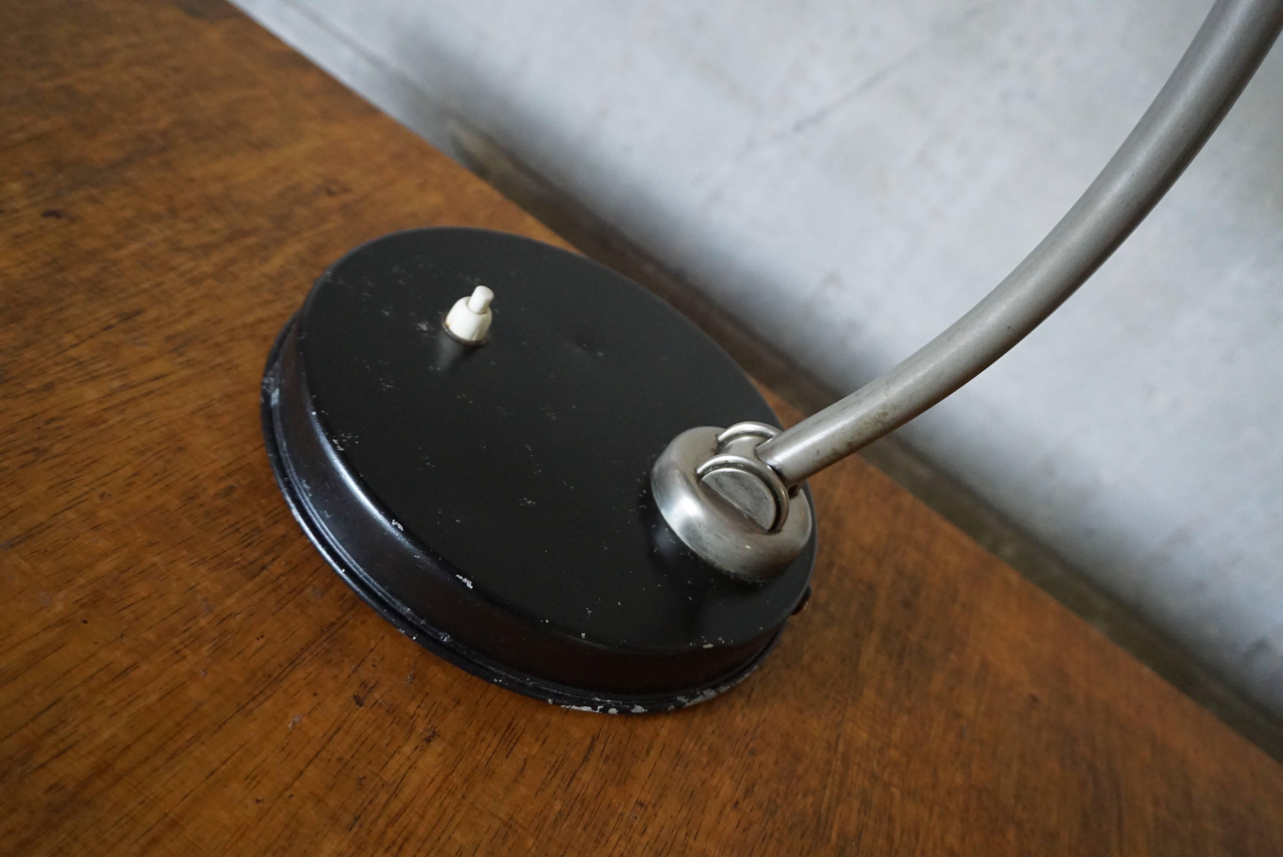 This desk lamp was produced in the 1930s Germany. It is in good condition and has been rewired.