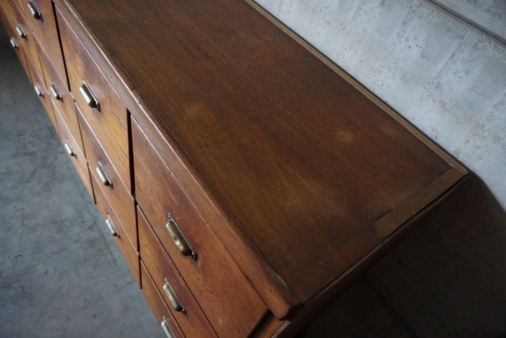 Industrial Vintage French Oak Apothecary Cabinet with Brass Hardware, 1930s