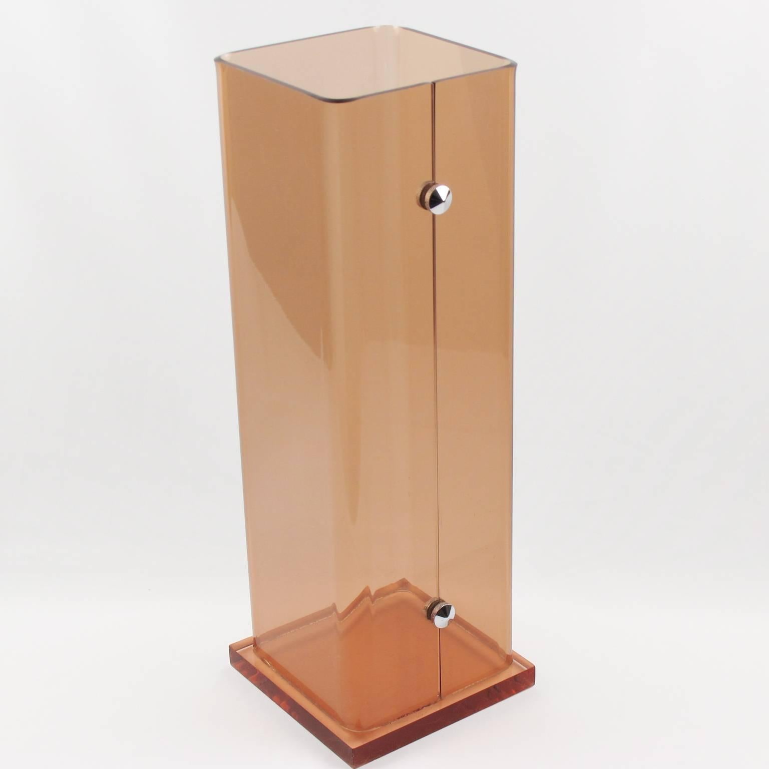 Elegant vintage Lucite umbrella stand designed for Roche Bobois, France in 1970s. Geometric tall shape with chrome accent and transparent smoked Lucite. Great accessory for any modern interior. Very good vintage condition.

Measurements: 7.07 in.