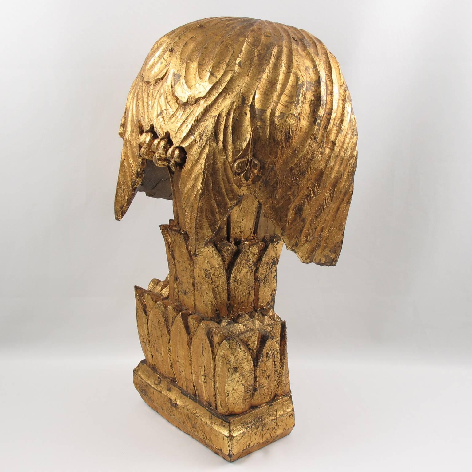 Beautiful gilded wood ornament, France, circa 1920s. Entirely all hand-carved heavy wood architectural fragment sculpture with elegant original patina. All covered with 18-karat gold leaf. Interesting design that can be placed standing on shelf or