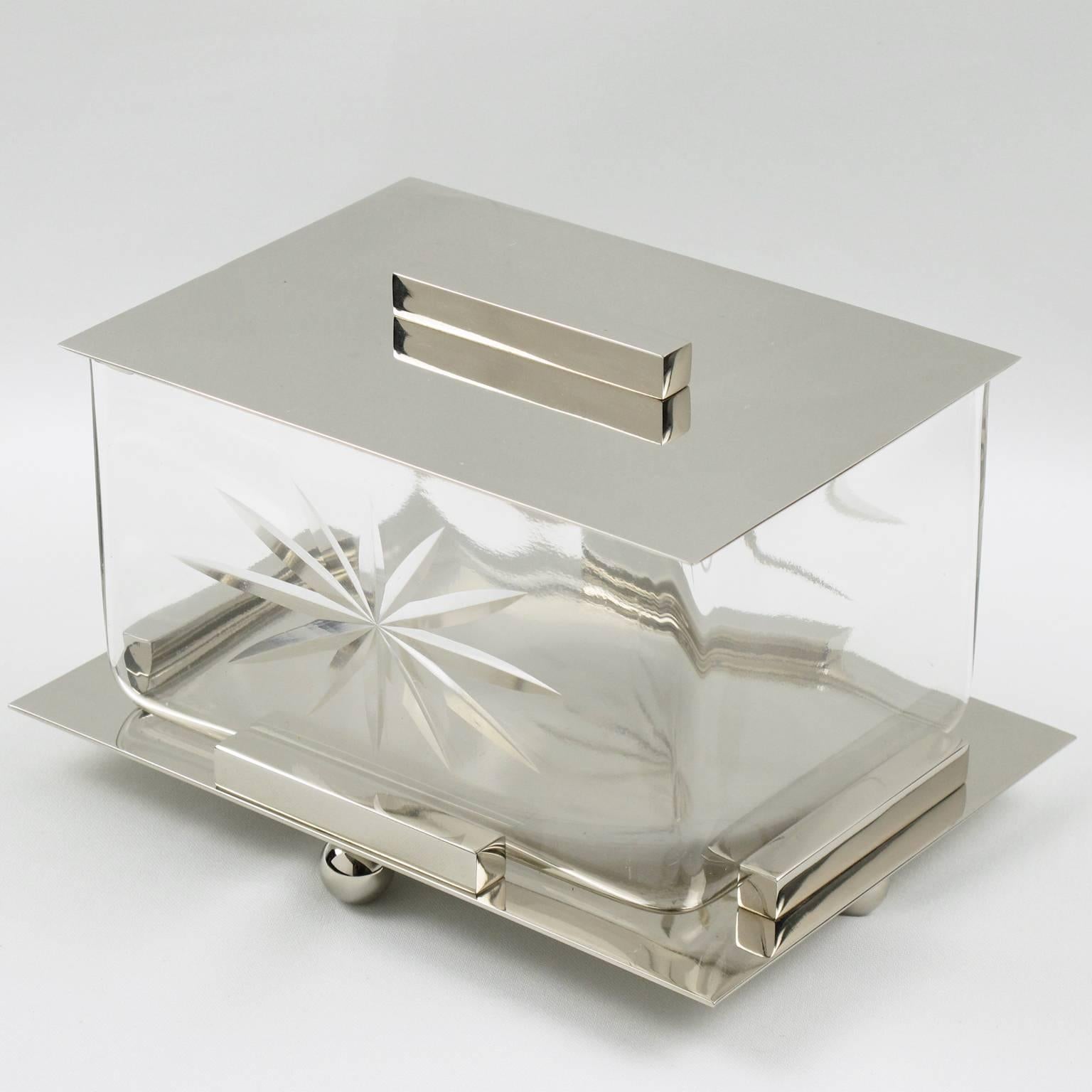 Elegant vintage French Art Deco chrome and crystal decorative cookie box, circa 1930s. Modernist Minimalist design with heavy chromed metal holder base and lid. Crystal cut insert bowl with large star etching on both sides. Excellent vintage
