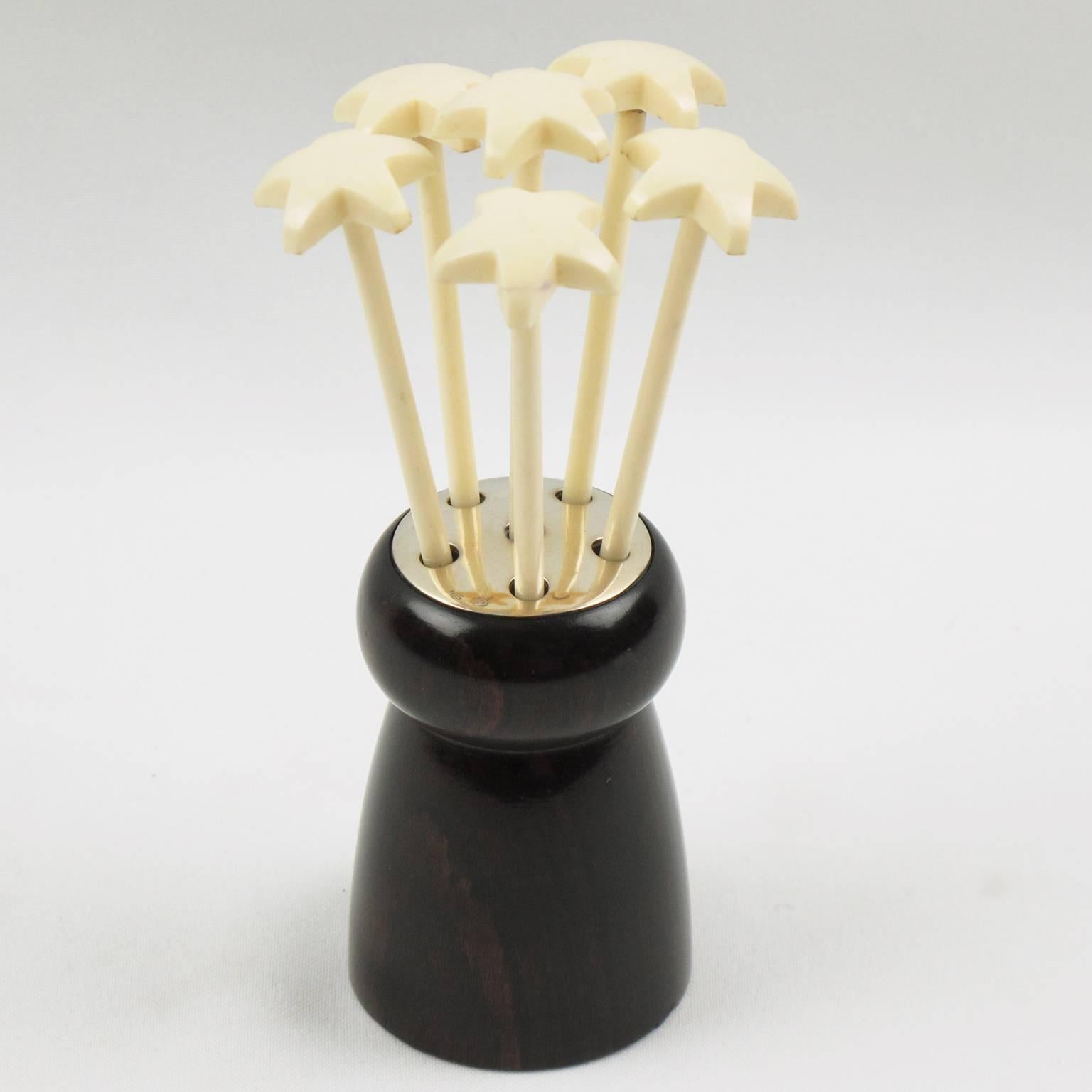 Rare French Art Deco barware bar set cocktail swizzle sticks stirrers. Featuring a huge champagne cork made of Macassar ebony wood and sterling silver with six off-white hard plastic stir sticks with star finial. Legal hallmarks stamps on metal. The