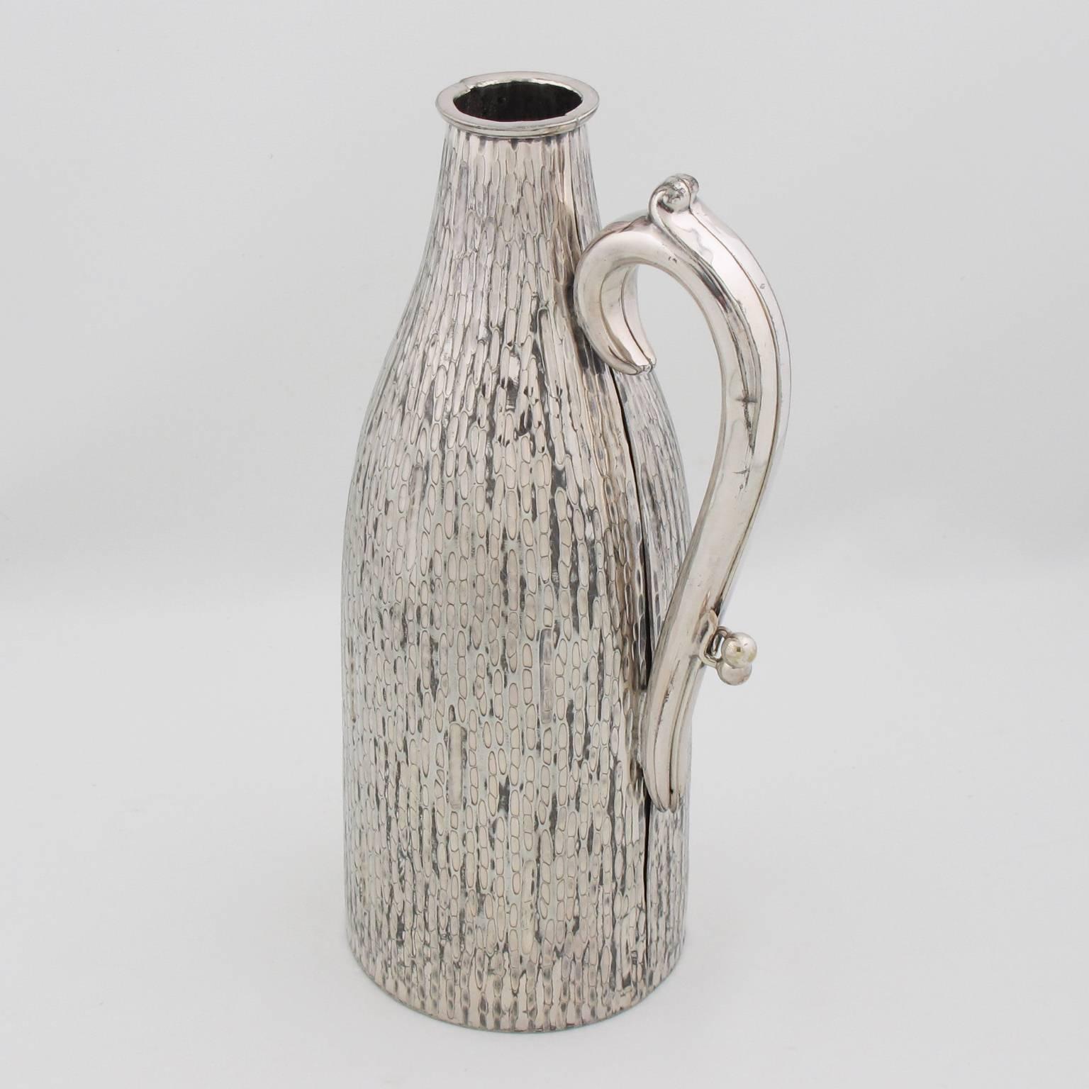 Extremely rare vintage Art Deco barware accessory, silver plate wine bottle cooler by Kirby Beard & Co, England / Paris, circa 1930s. Great modernist design with engraving and textured pattern throughout and carved large handle. The cooler splits in