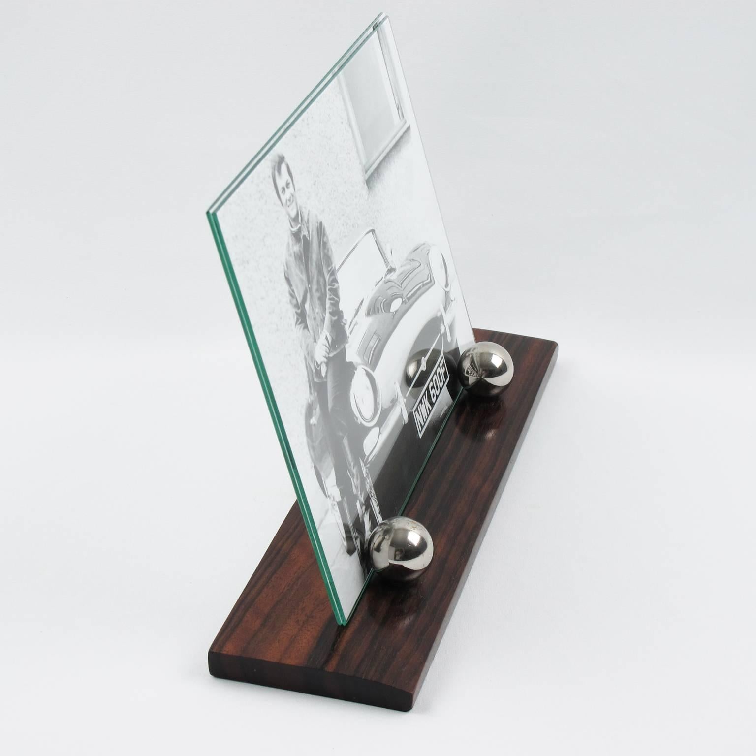 Elegant French Art Deco picture photo frame. Featuring thick hand-rubbed Macassar wood plinth compliment with two polished chrome metal balls. The frame is complete with its two glass sheets to enclose the photograph. Very good vintage condition.