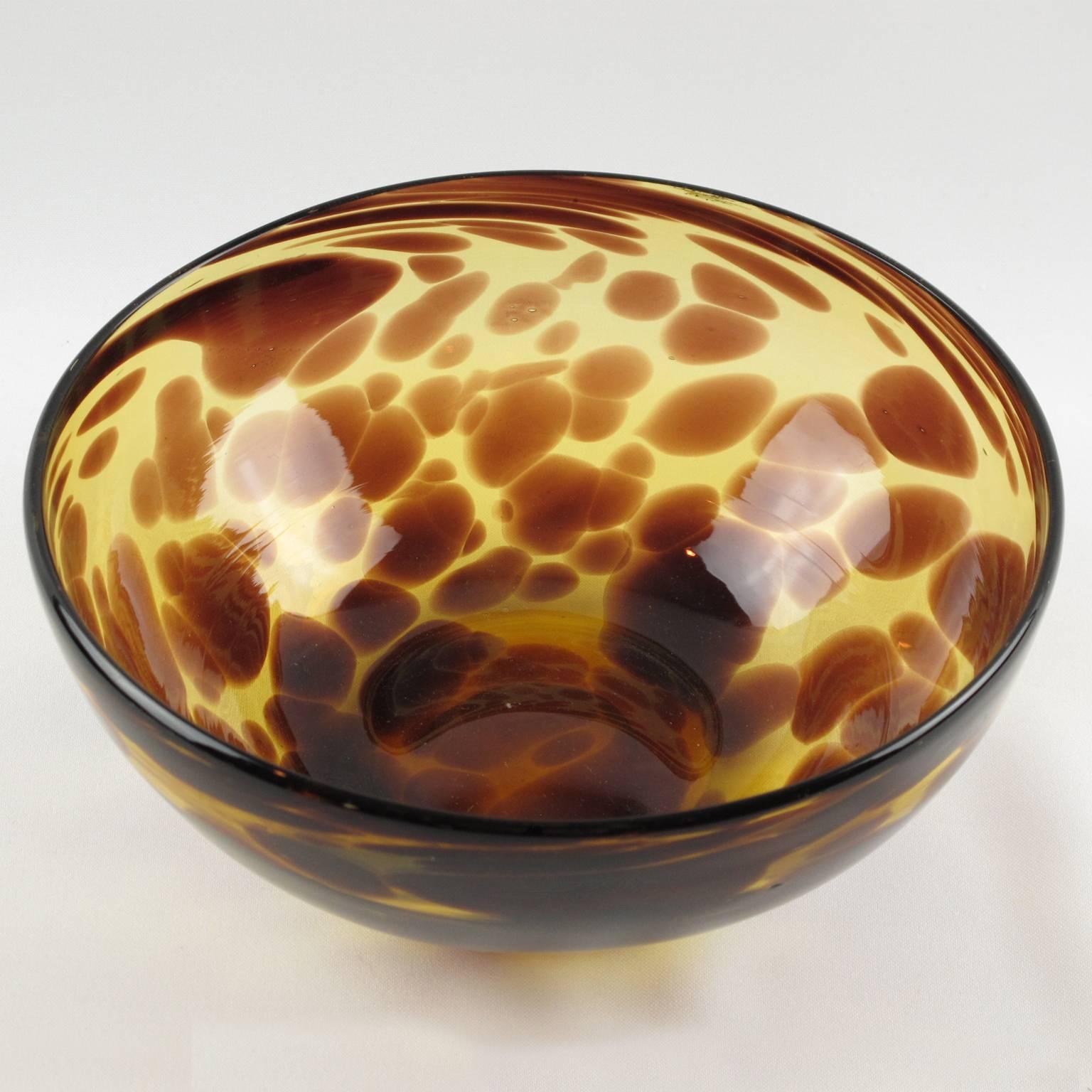 Vintage French Designer Christian Dior Glass Bowl. From the Dior Home Collection mouth-blown in Empoli, Italy in the 1960s. Exclusive tortoise shell color flowing pattern. Polished pontil mark on the bottom. Excellent condition.

Measurements:
