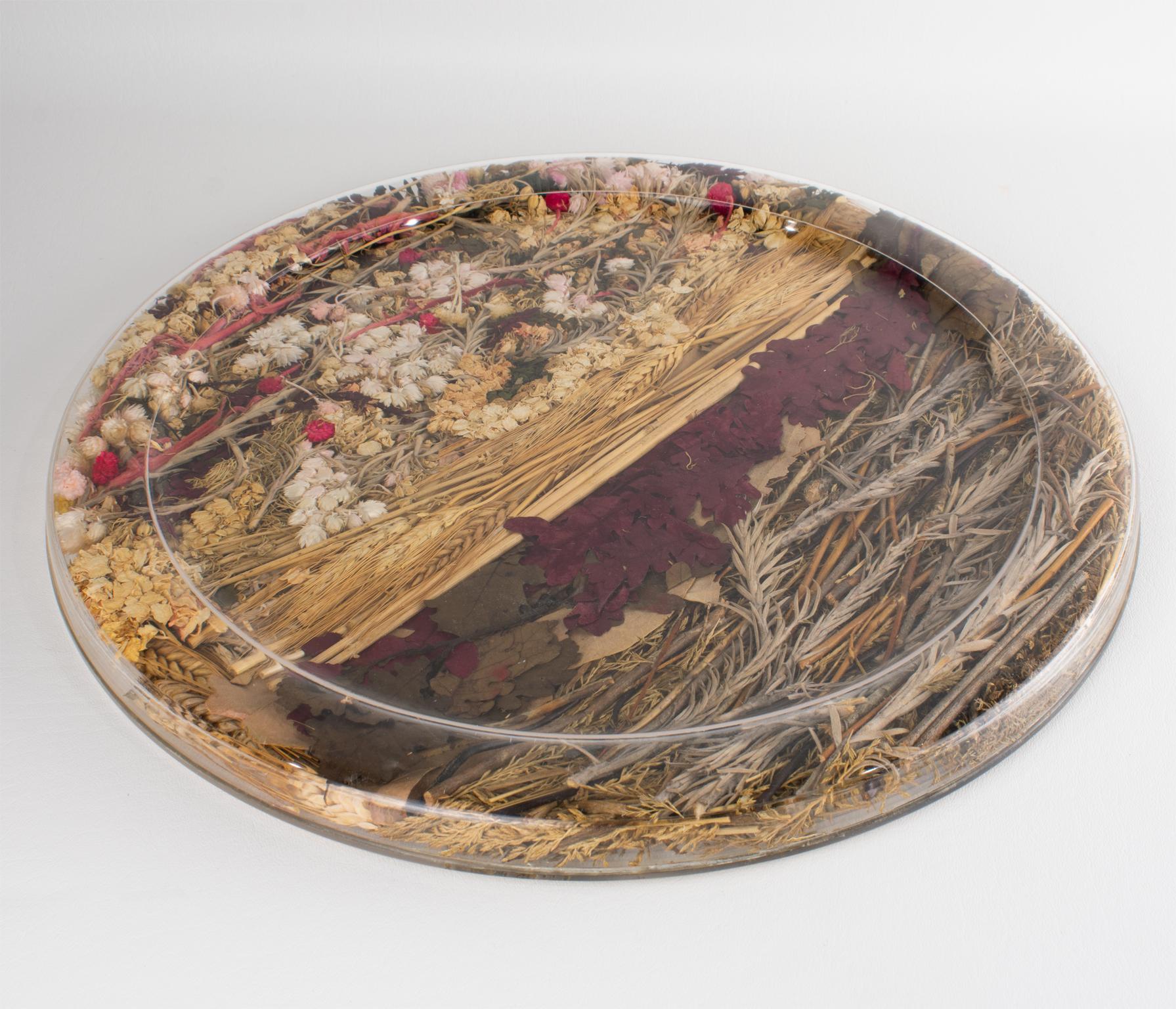 This stunning serving tray was designed for the Christian Dior Interior Collection. The rare piece was crafted in France circa 1970. The board or platter has a rounded shape and raised edges. Complete with an organic flair, these items are crafted