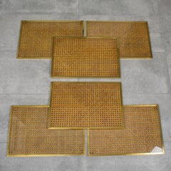 Tovagliette e sottopiatti Christian Dior in rattan e ottone in stile modernista, 6 pezzi, intorno al 1970